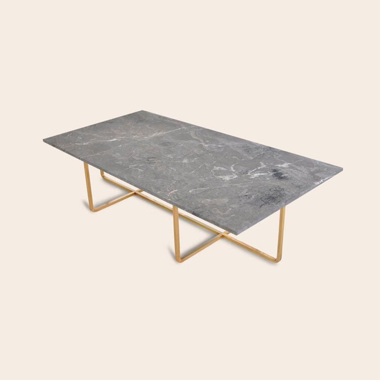 Grey marble and brass large ninety table by OxDenmarq
Dimensions: D 120 x W 60 x H 40 cm
Materials: Brass, grey marble
Also available: Different size, top and frame options available

OX DENMARQ is a Danish design brand aspiring to make beautiful