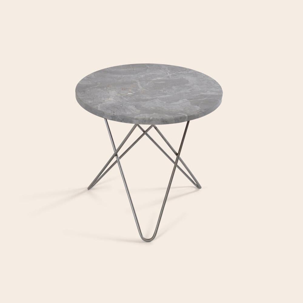 Grey Marble and Steel Mini O table by OxDenmarq
Dimensions: D 40 x H 37 cm
Materials: Steel, Grey Marble
Also Available: Different top and frame options available.

OX DENMARQ is a Danish design brand aspiring to make beautiful handmade