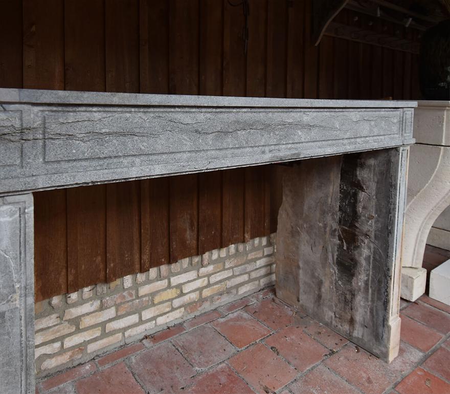 Grey marble stone Louis XVI fireplace 19th Century In Fair Condition For Sale In Udenhout, NL