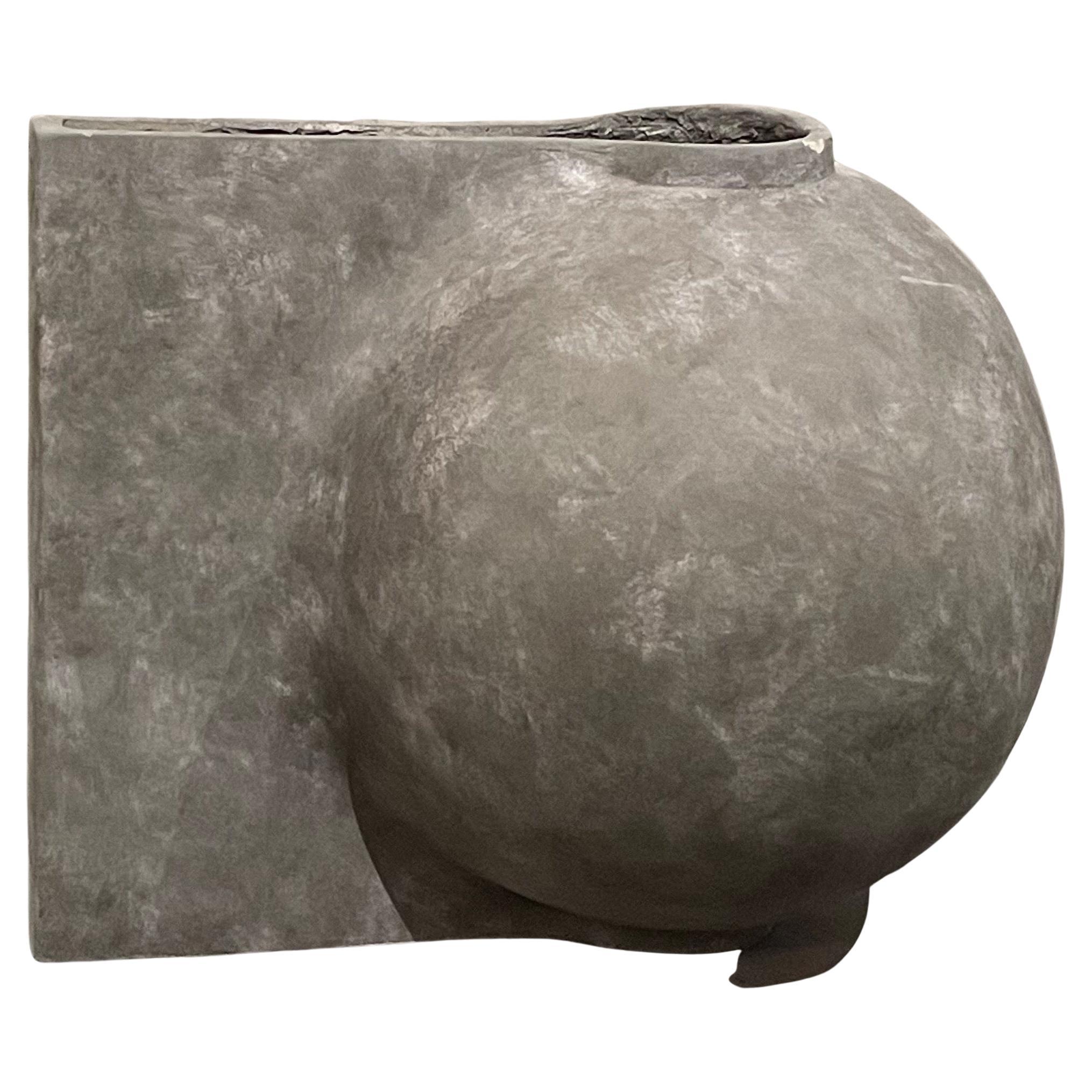 Contemporary Chinese Danish designed large matte dark grey vase.
Offset rectangular slab shaped handle.
Part of a large collection.