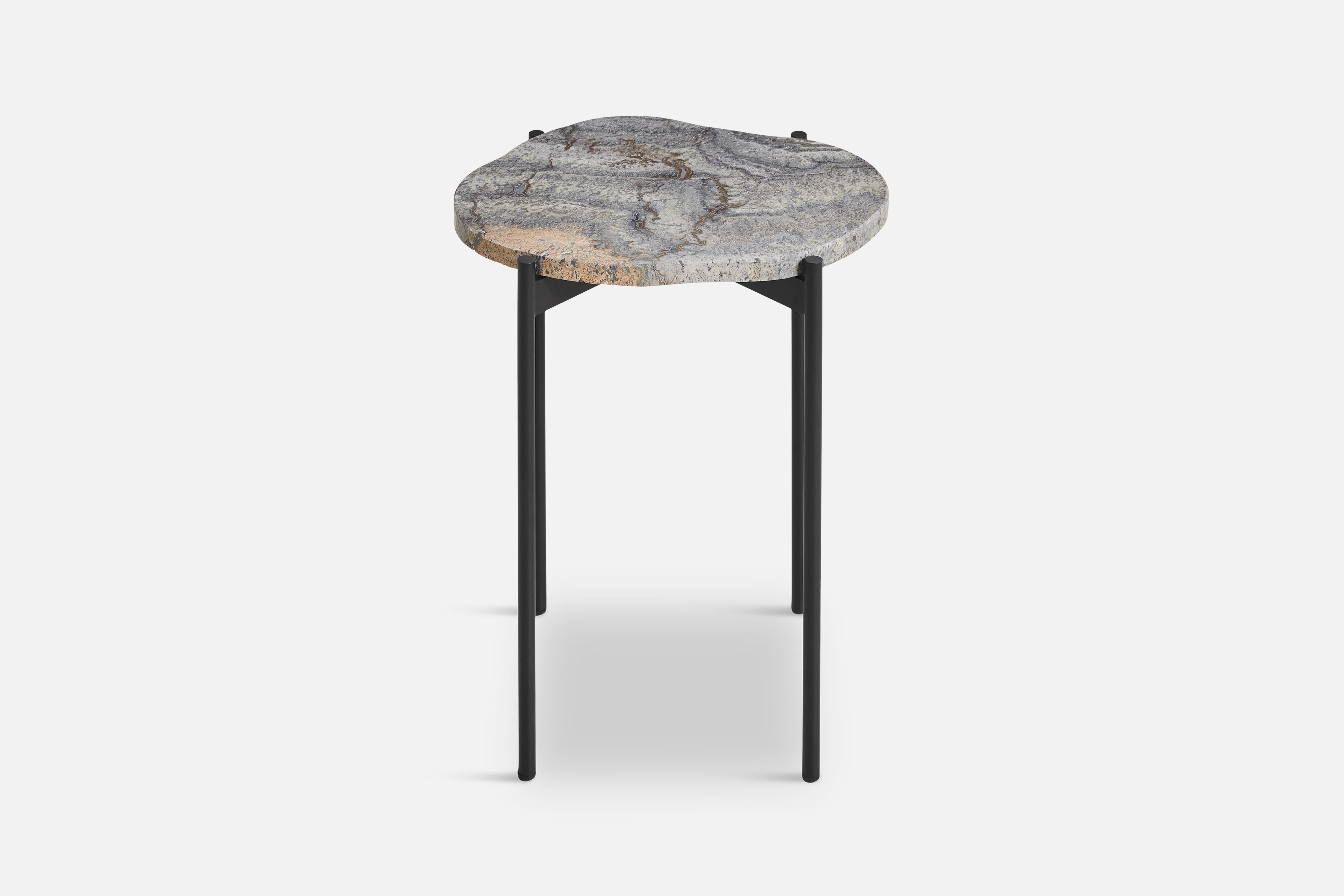 La Terra small occasional table by Agnes Morguet
Materials: Metal, Grey Melange Travertine
Dimensions: D 31.2 x W 40.5 x H 45.7 cm

The founders, Mia and Torben Koed, decided to put their 30 years of experience into a new project. It was time