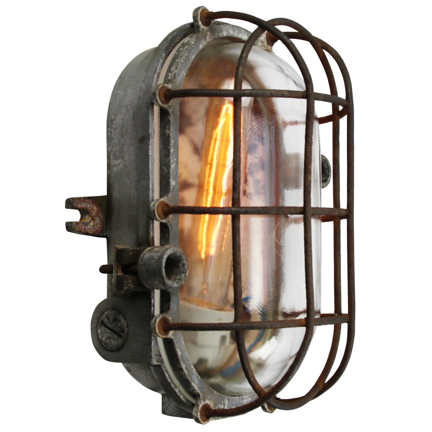 Industrial wall or ceiling lamp
grey cast aluminum, clear glass

Weight: 2.90 kg / 6.4 lb

Priced per individual item. All lamps have been made suitable by international standards for incandescent light bulbs, energy-efficient and LED bulbs.