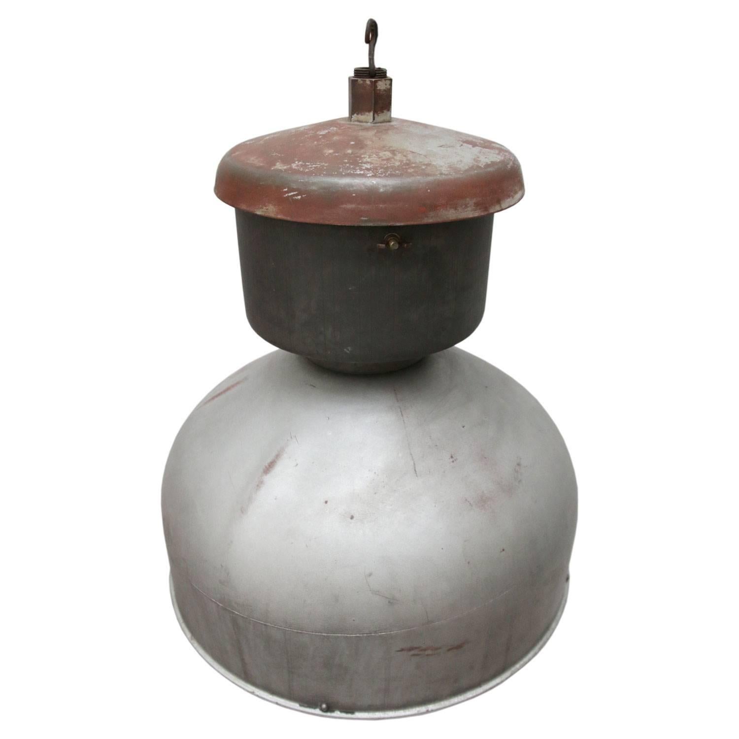 Industrial hanging lamp. Grey metal.

Weight: 11.0 kg / 24.3 lb

Priced per individual item. All lamps have been made suitable by international standards for incandescent light bulbs, energy-efficient and LED bulbs. E26/E27 bulb holders and new