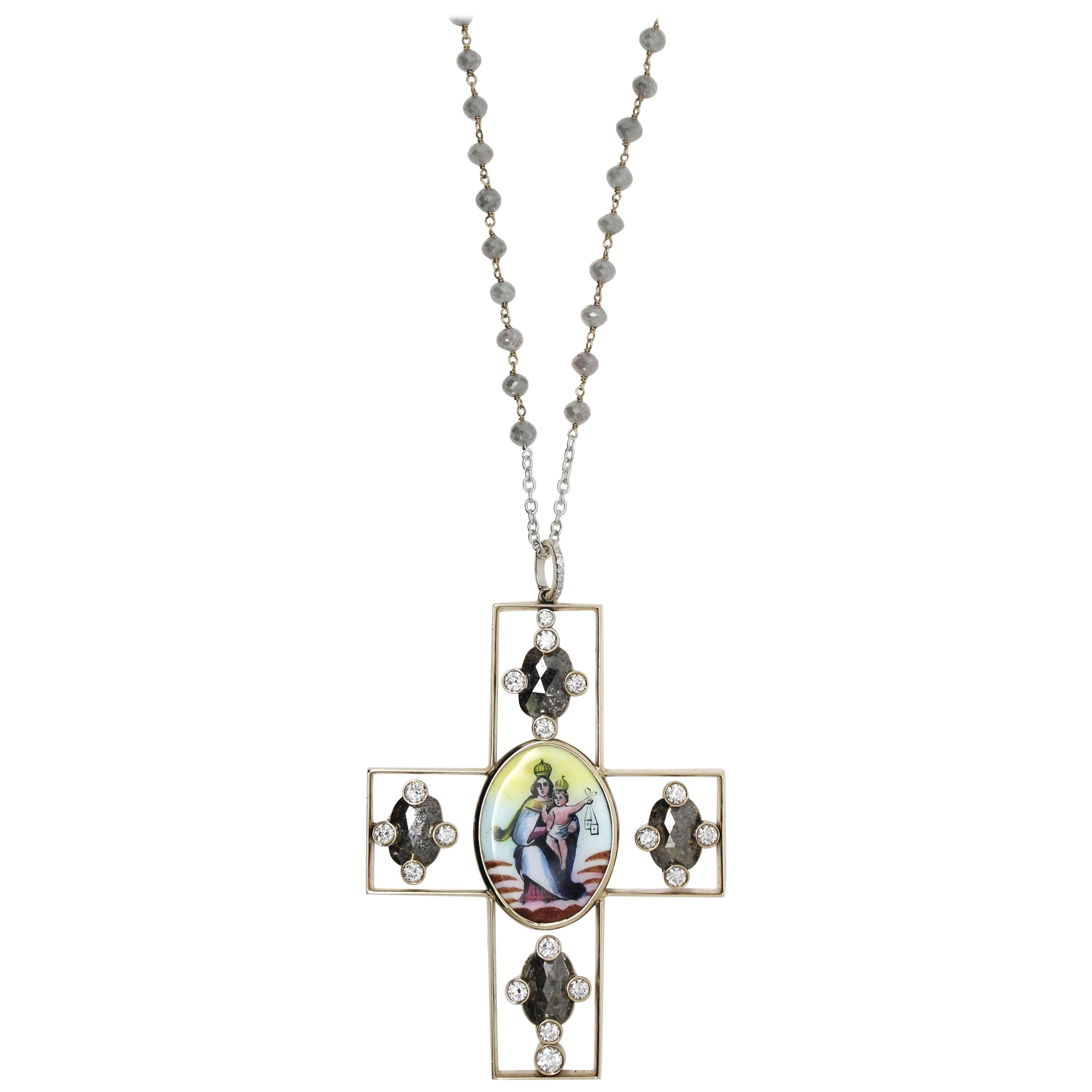 A Modern Rosary Necklace with 50 Grey Diamond Beads combined in 5 sequences spaced out with a white diamond.
The important Pendant Cross has an Enamelled  Holy Image in the centre, and is decorated with 4 Milky Grey Oval Rose-Cut Diamonds, each