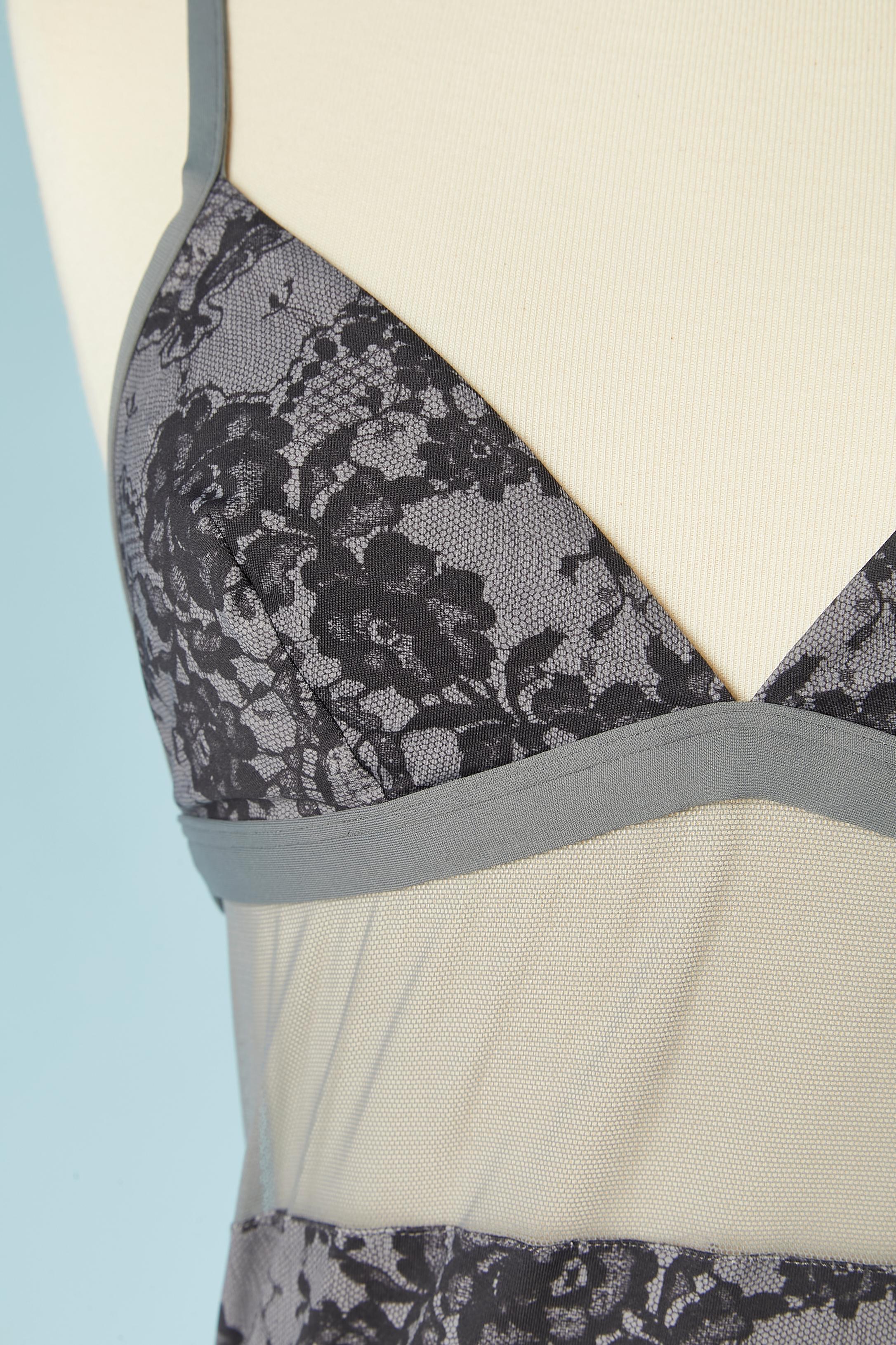 Grey mini slip dress with black laces print. Fabric composition: nylon & elastane
SIZE M 