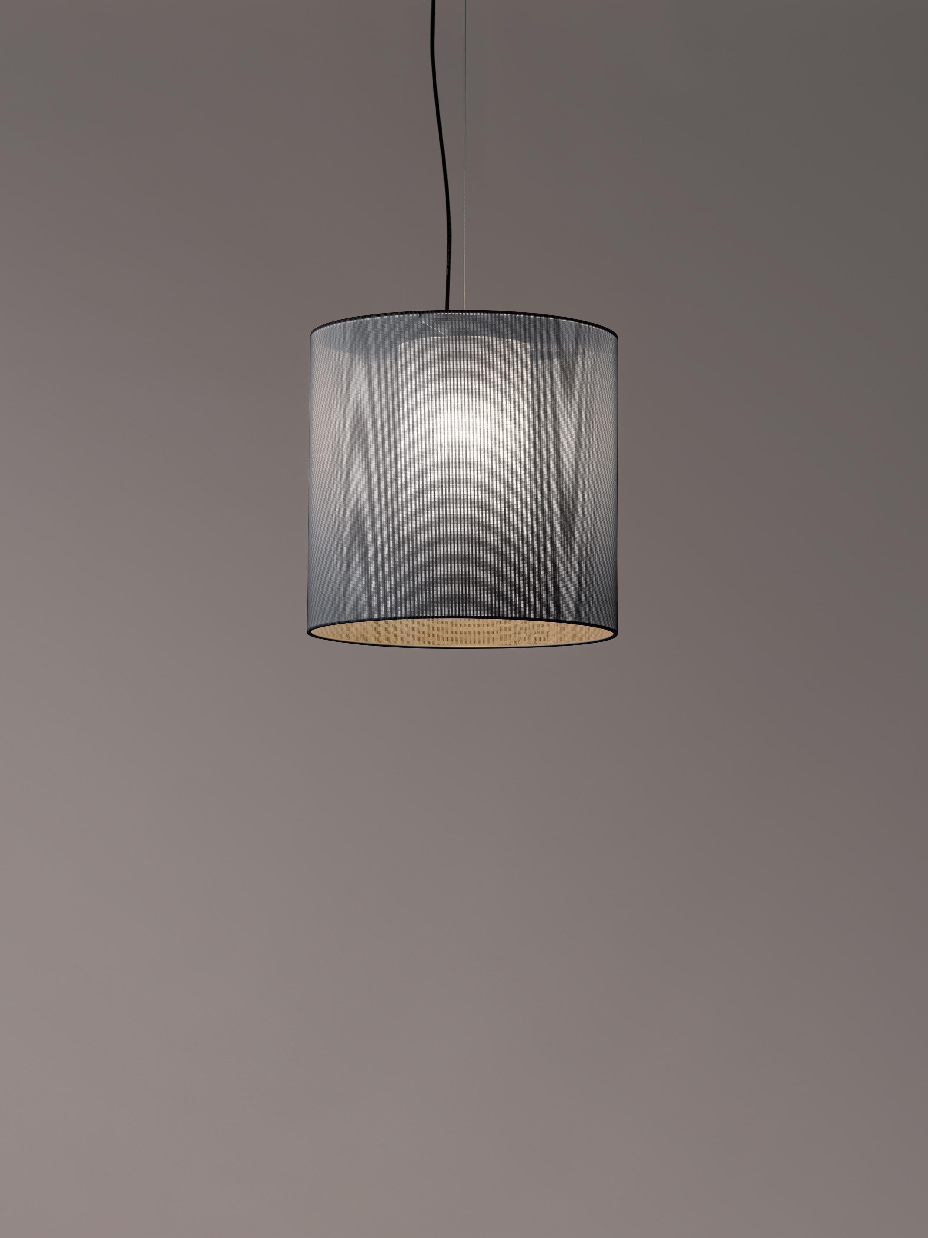 Grey Moaré M pendant lamp by Antoni Arola
Dimensions: D 46 x H 45 cm
Materials: metal, polyester.
Available in other colors and sizes.

Moaré’s multiple combinations of formats and colours make it highly versatile. The series takes its name
