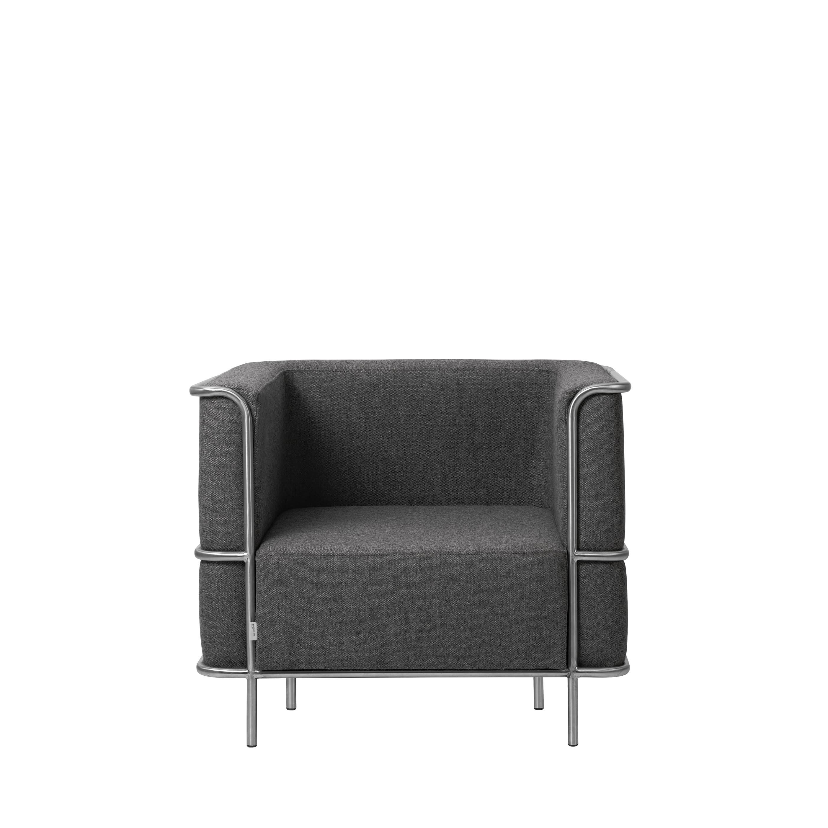 Grey modernist lounge chair by Kristina Dam Studio.
Materials: Dark grey wool
Dimensions: 87 x 77 x 70 cm


Kristina Dam graduated from The Royal Danish School of Fine Arts, Architecture and Design in Copenhagen. In her designs you will find