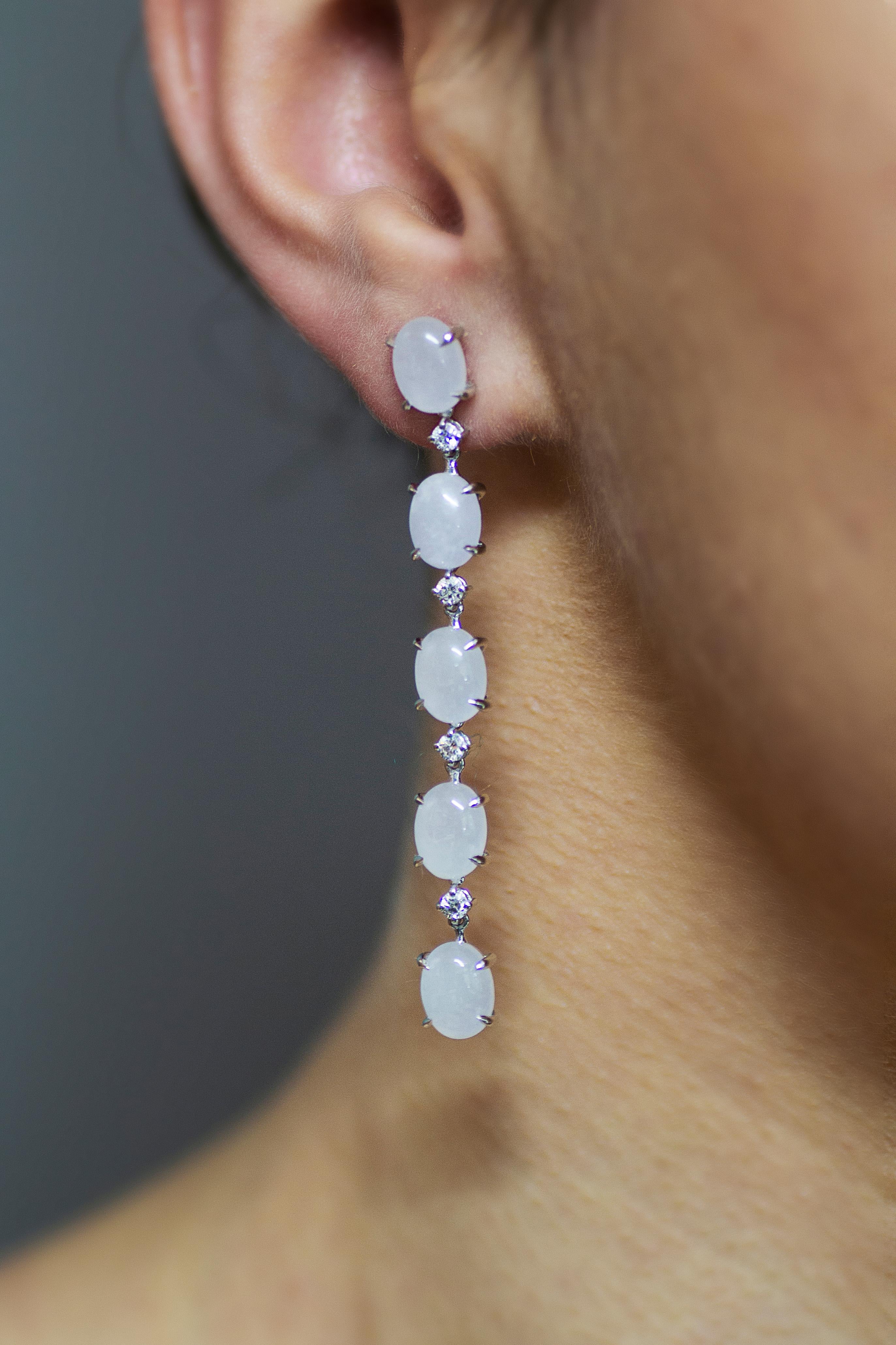 Exquisite design handcrafted in Italy, in Margherita Burgener family workshop.
This elegant  pair of earrings is a very refined combination of a light grey hues jade and  white diamonds.

18 KT white gold grams 6.52
n.8 diamonds for total carat