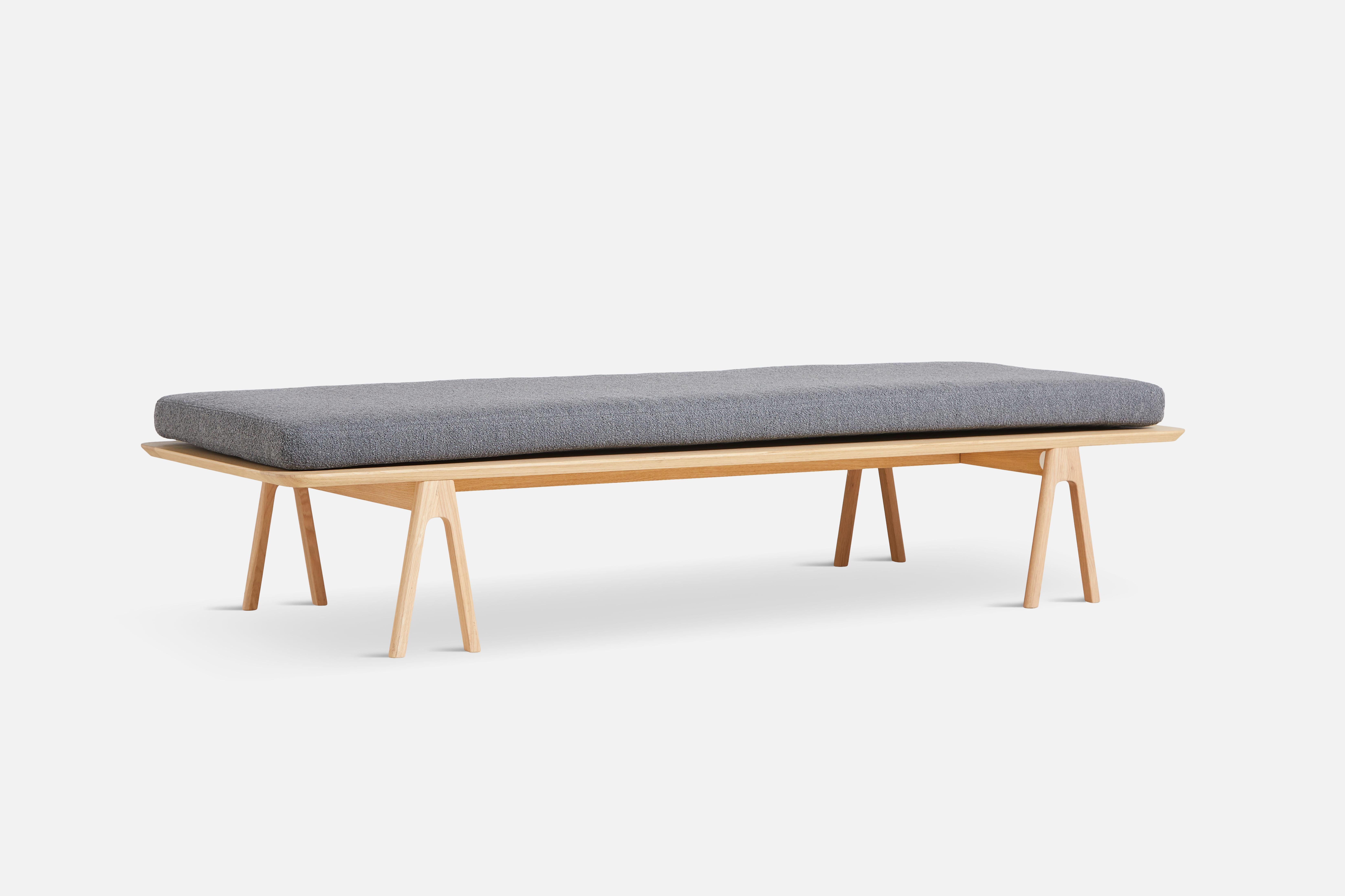 Grey oak level daybed by Msds studio.
Materials: foam, oak, non slip fabric.
Dimensions: D 76.5 x W 190 x H 41 cm
Also available in different colours.

The founders, Mia and Torben Koed, decided to put their 30 years of experience into a new