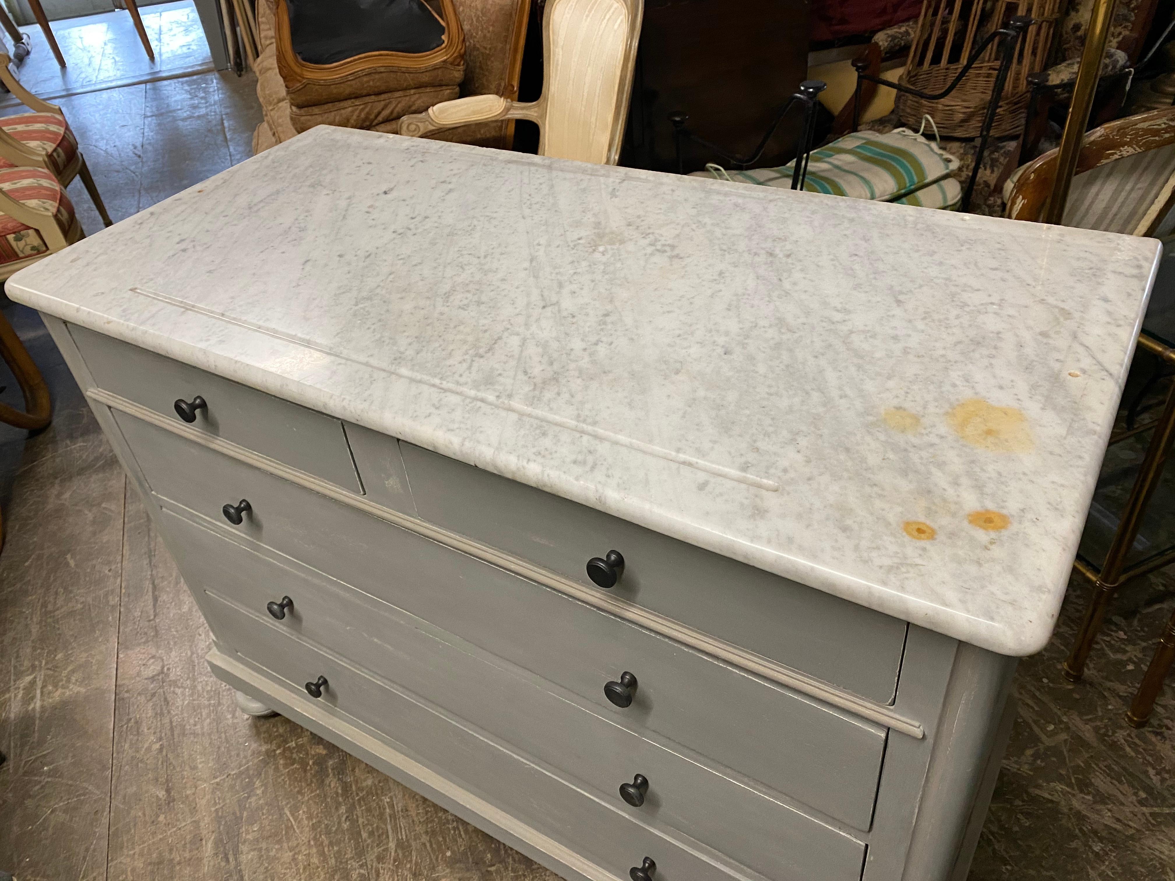 chest of drawers with marble top