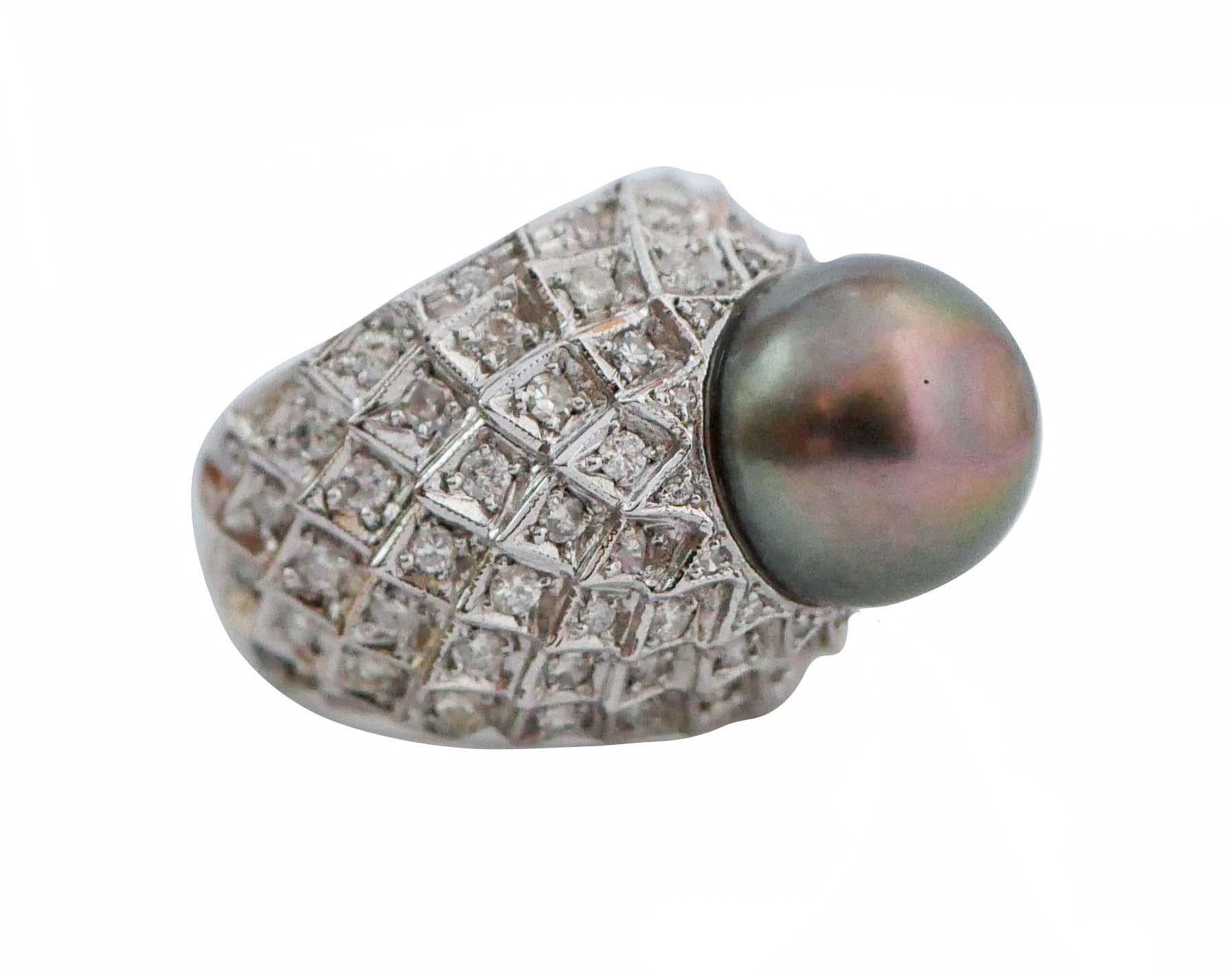 Amazing ring in 14 kt white gold structure mounted with a grey pearl in a frame of diamonds.
This ring was totally handmade by Italian master goldsmiths and it is in perfect conditions.
Diamonds 2.06 ct
Pearl 2.90 gr - 12.5 mm
Total Weight 14.50
