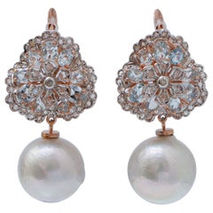 Perle grigie, topazi color acquamarina, diamanti, orecchini in oro rosa e argento