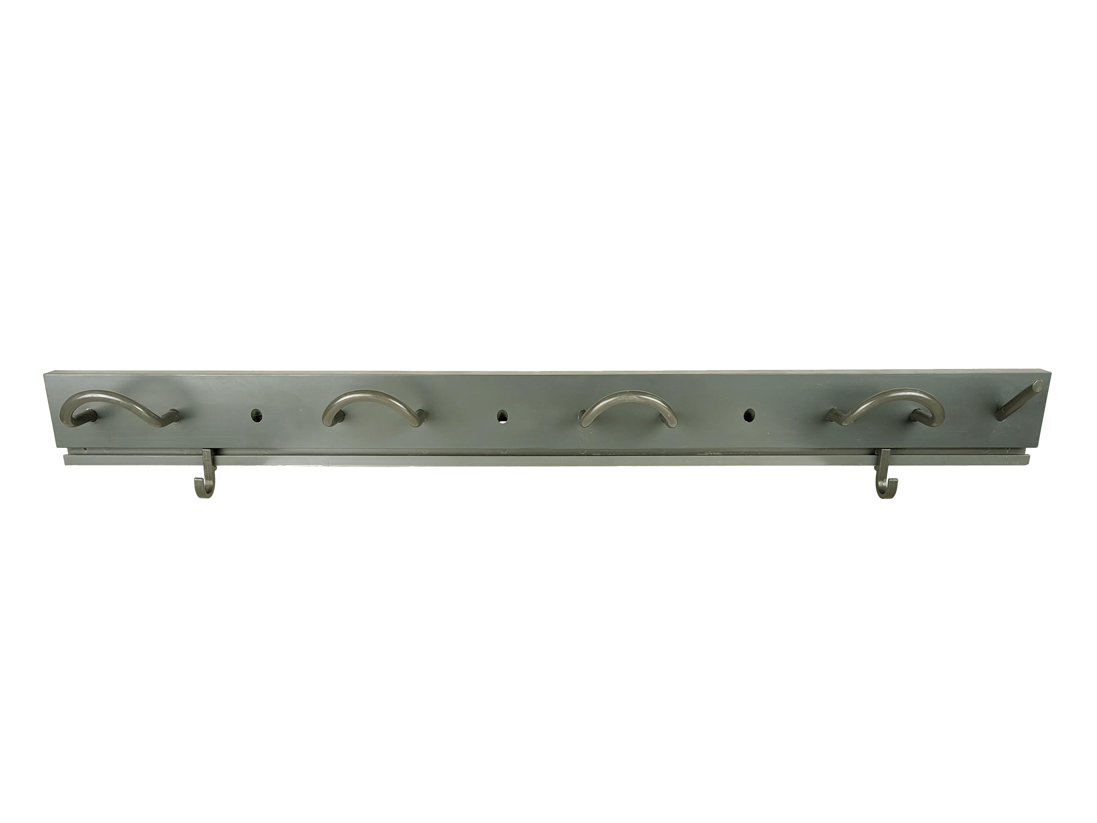 Grey plastic coat rack with several hooks produced by Kartell in the 1980s. The hooks can be positioned in different positions according to needs.