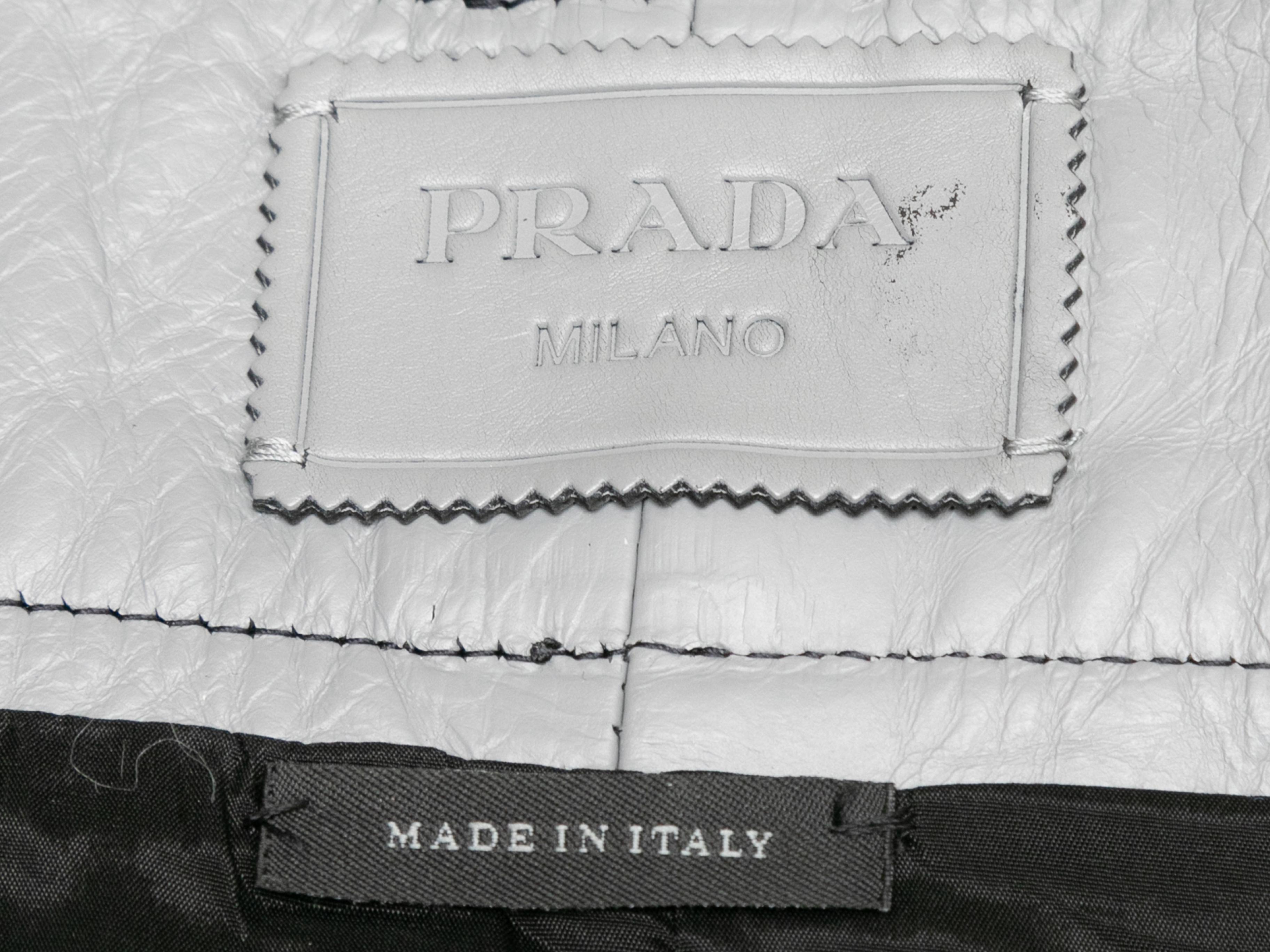 Grey leather 2018 skirt by Prada. Black leather trim. Three back pockets. Side closure. 34