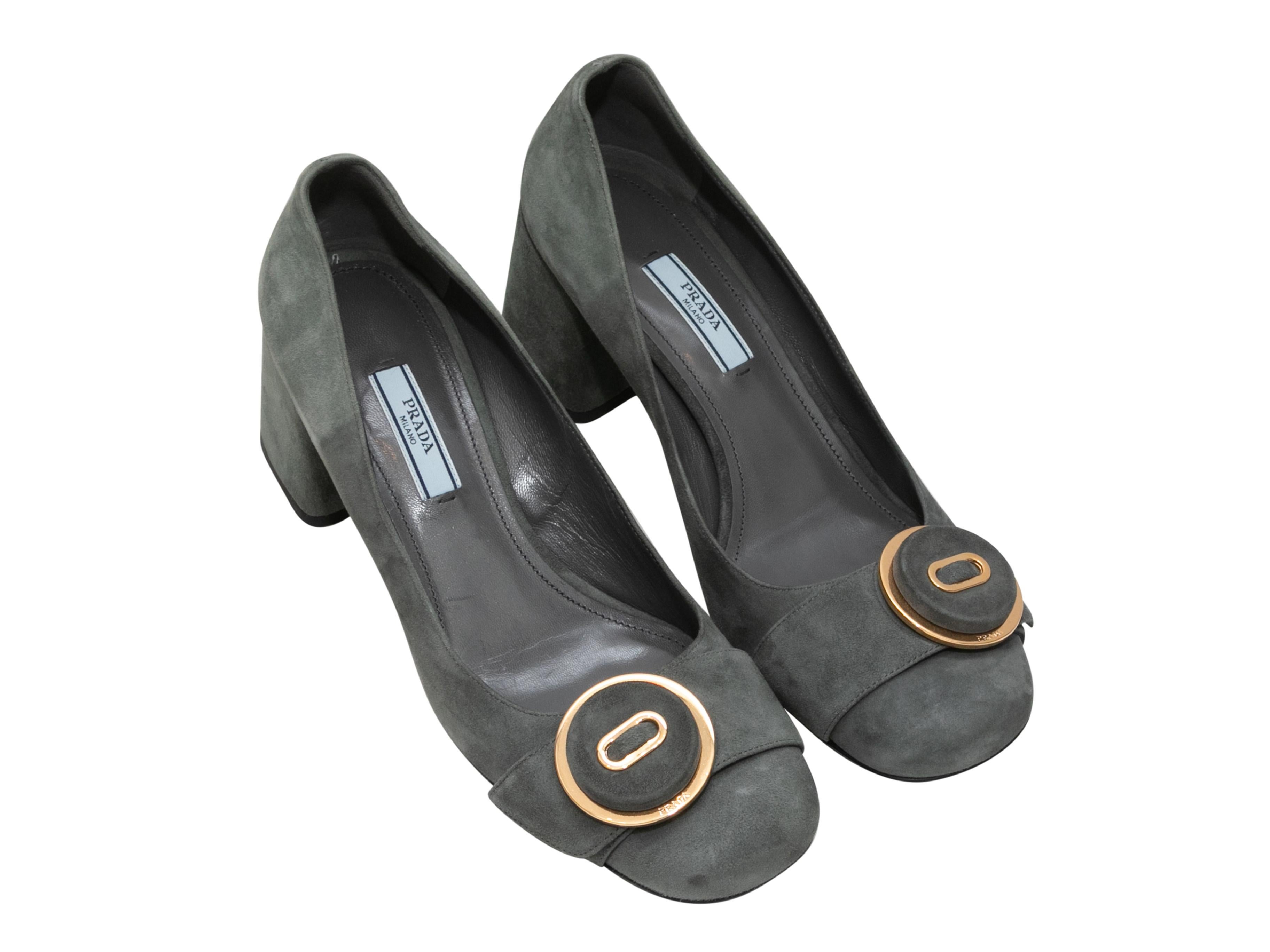  Grey suede buckle pumps by Prada. Gold-tone buckle accents at tops. Block heels. 2.5
