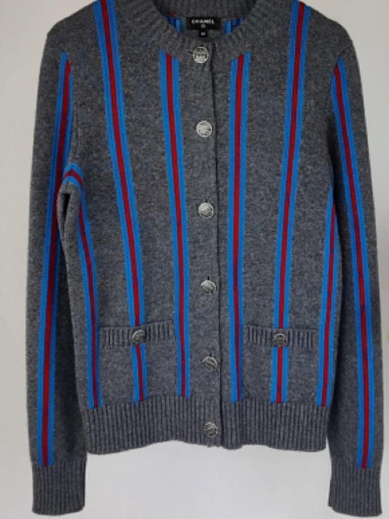 Chanel Grey Cashmere Cardigan Size 36 (UK 8)
 
 
 This Cardigan has been used a few times but is in great condition with no visible signs of wear 
 
 Materials - 100% Cashmere 
 Fastens with buttons along the front of the garment 
 Size Conversion