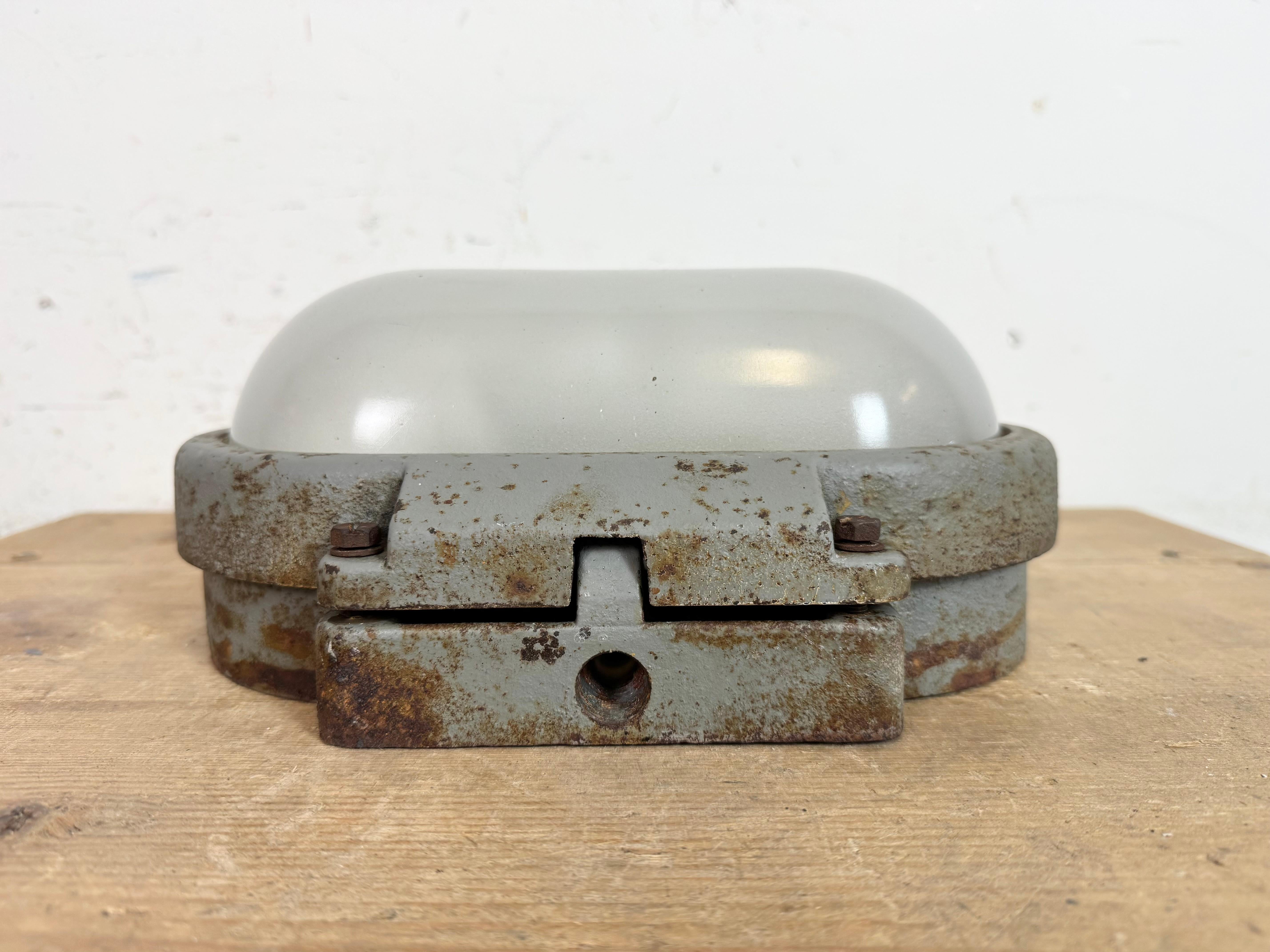 Czech Grey Rusty Industrial Cast Iron Wall Light from Elektrosvit, 1960s For Sale