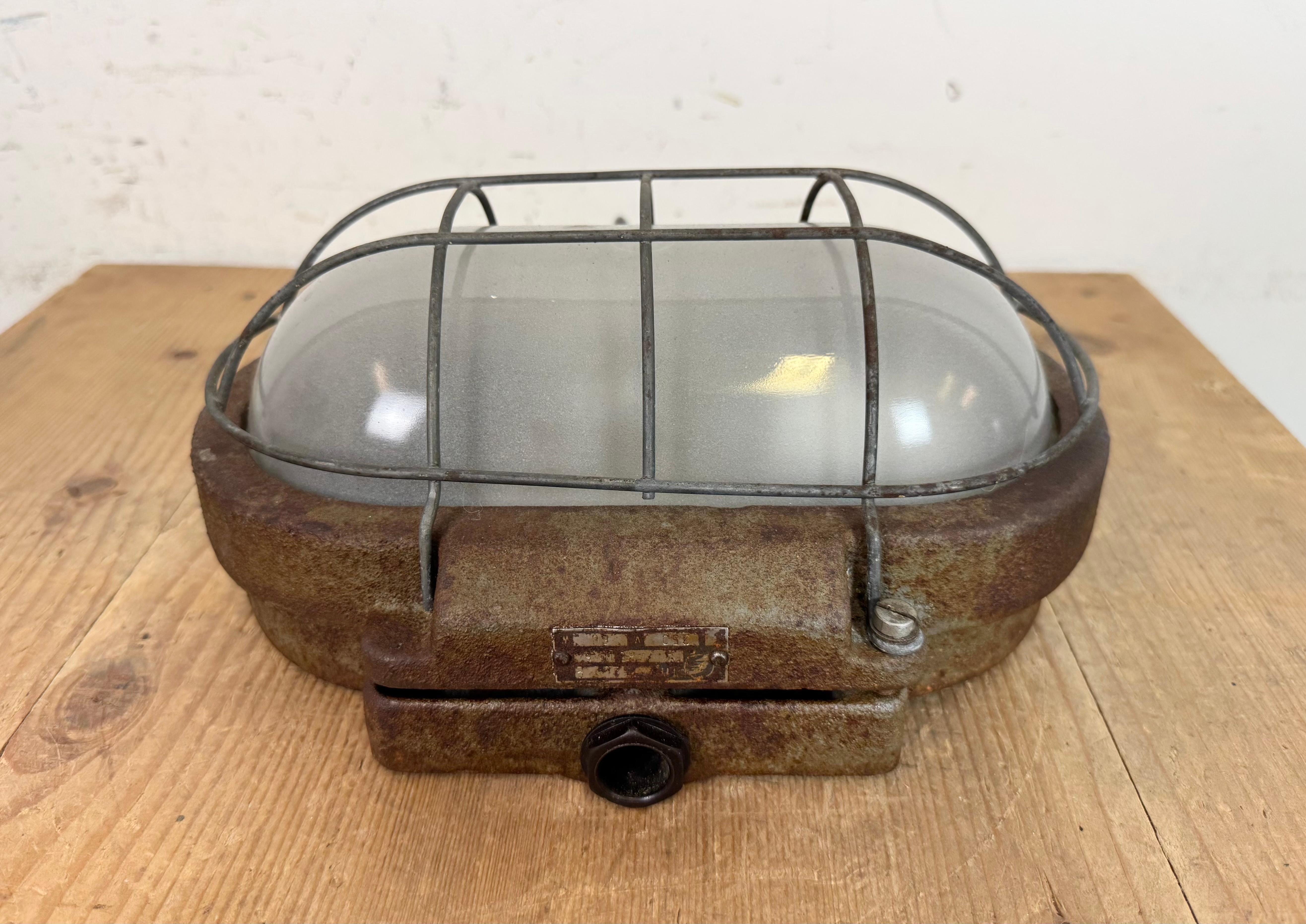 Czech Grey Rusty Industrial Cast Iron Wall Light from Elektrosvit, 1960s For Sale