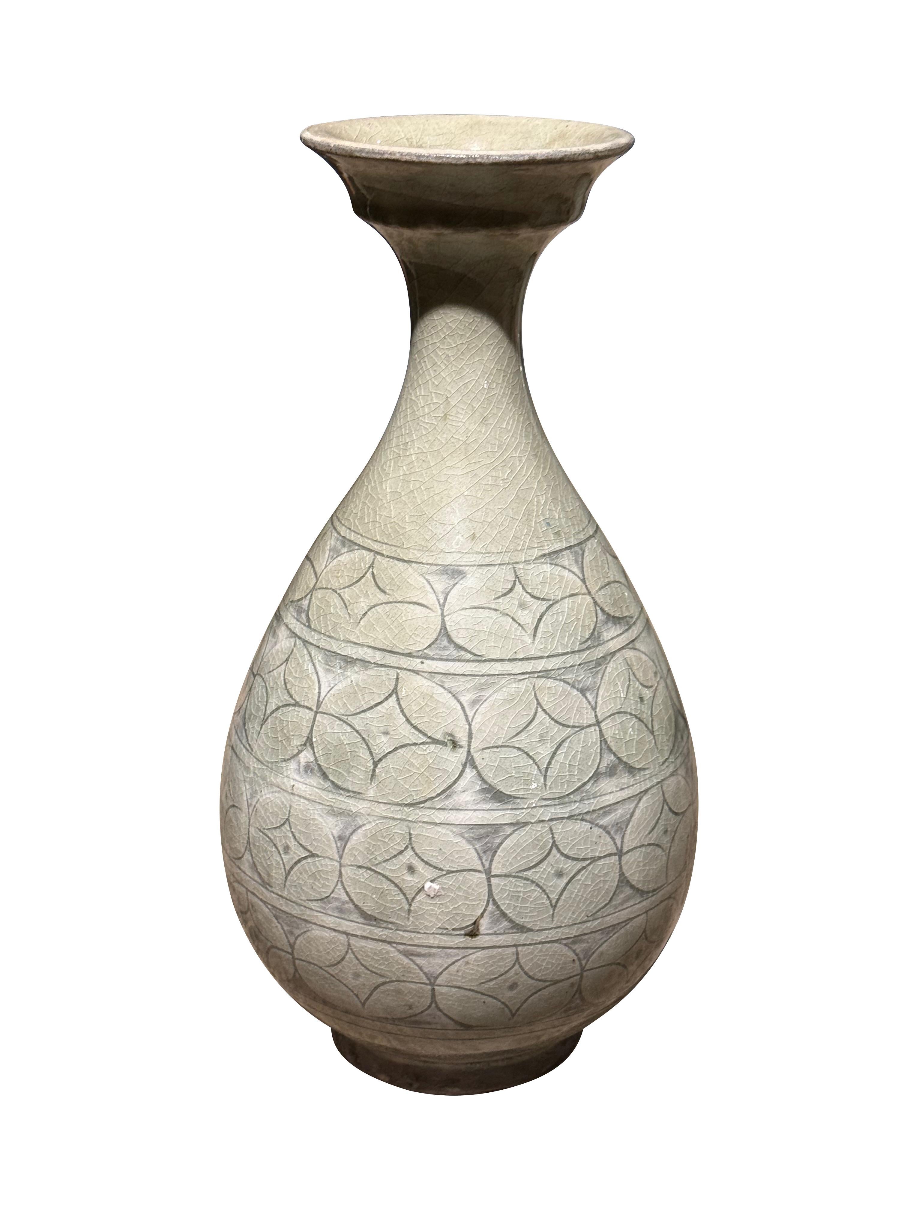 Contemporary Chinese collection of patterned grey/sage vases.
Horizontal bands of circular decorative pattern.
Collection of five with different shapes available.
Diameters range 5.5