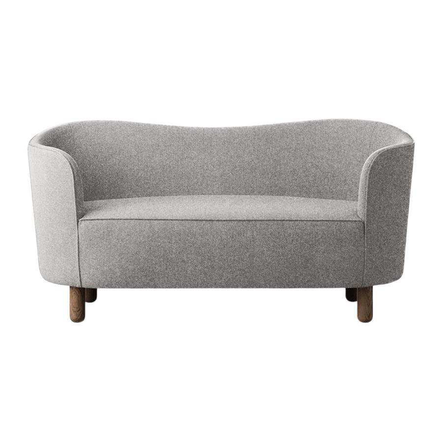 Grey sahco zero and smoked oak mingle sofa by Lassen.
Dimensions: W 154 x D 68 x H 74 cm.
Materials: textile, oak.

The Mingle sofa was designed in 1935 by architect Flemming Lassen (1902-1984) and was presented at The Copenhagen Cabinetmakers’