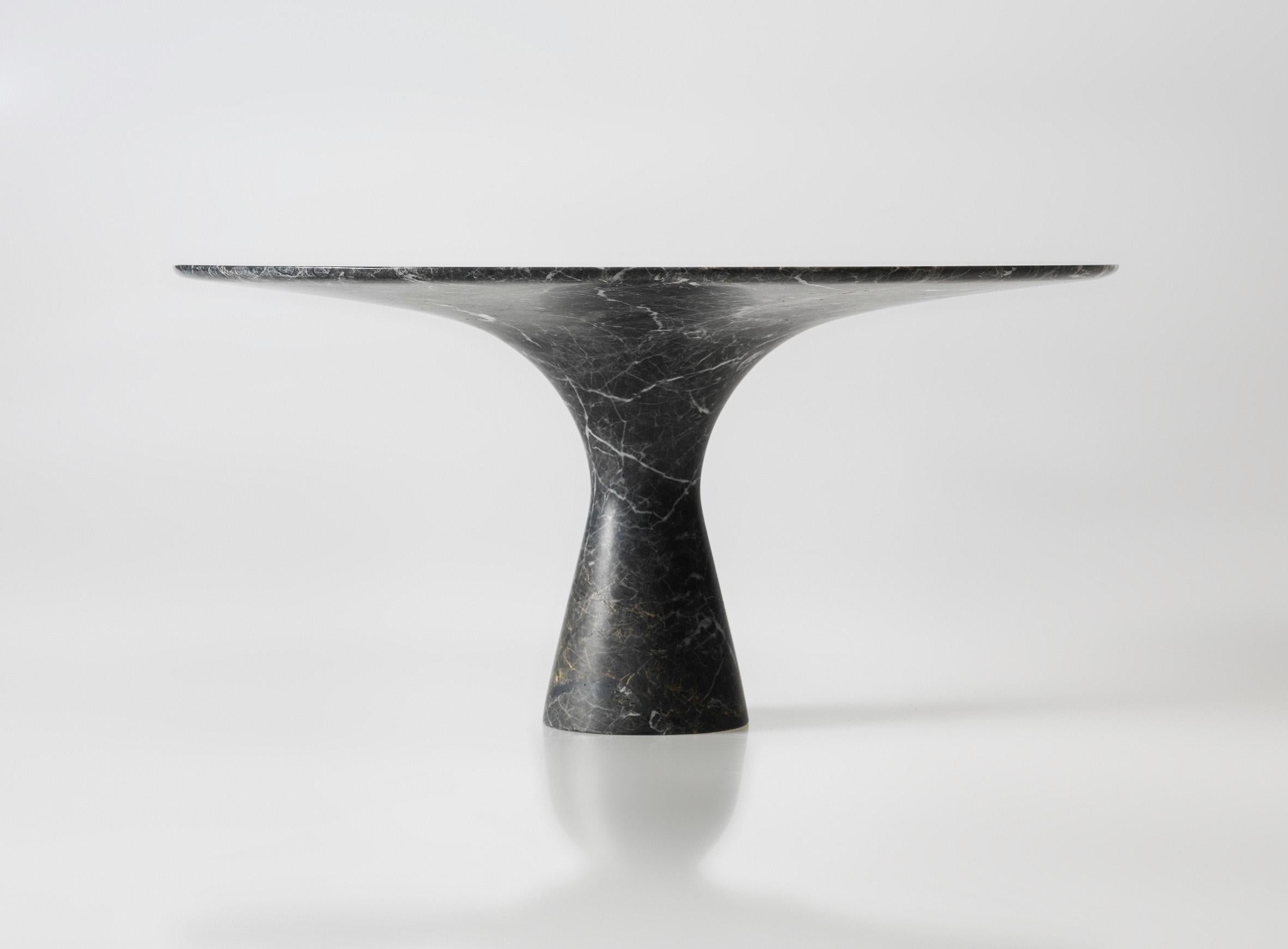 Grey Saint Laurent refined contemporary marble dining table 250/75
Dimensions: 250 x 160 x 75 cm
Materials: Grey Saint Laurent marble.

Angelo is the essence of a round table in natural stone, a sculptural shape in robust material with elegant lines