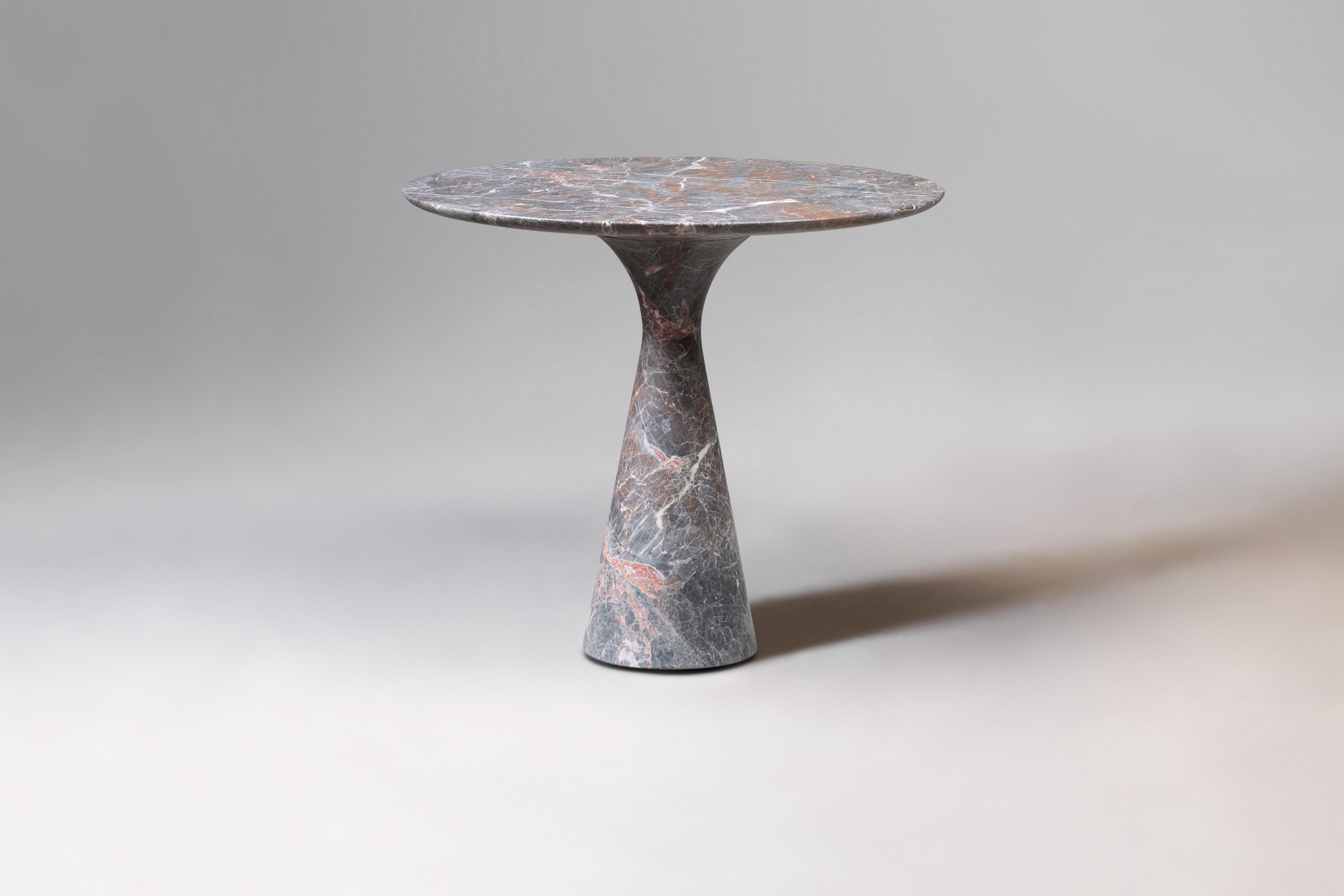 Grey Saint Laurent Refined Contemporary Marble Side Table 62/45
Dimensions: diameter 62 x height 45 cm
Materials: Grey Saint Laurent

Angelo is the essence of a round table in natural stone, a sculptural shape in robust material with elegant lines