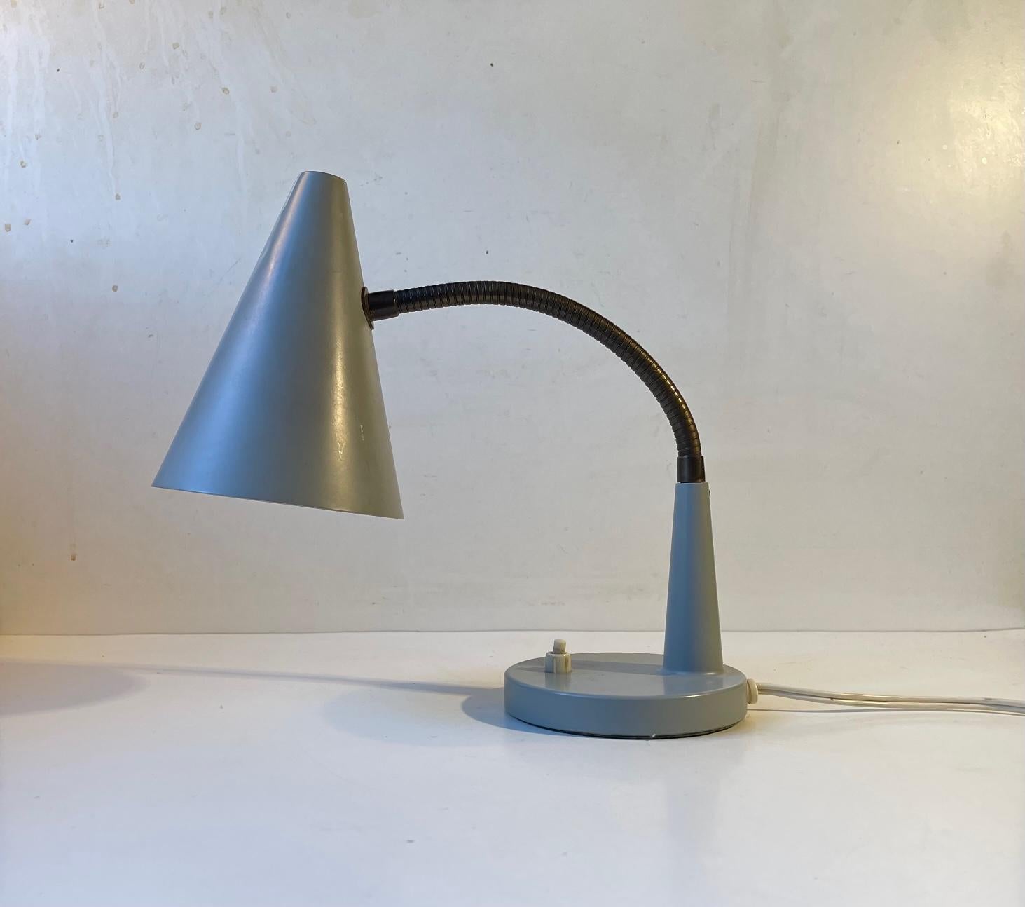 Small fully adjustable table lamp or wall light with flexible brass goose neck. Manufactured and designed by E. S. Horn in Aalestrup, Denmark during the 1950s. The style of this light is highly influenced by the Bauhaus movement, Arne Jacobsen and
