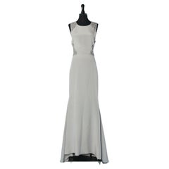 Grey sleeveless evening dress with beaded work on the back and waist