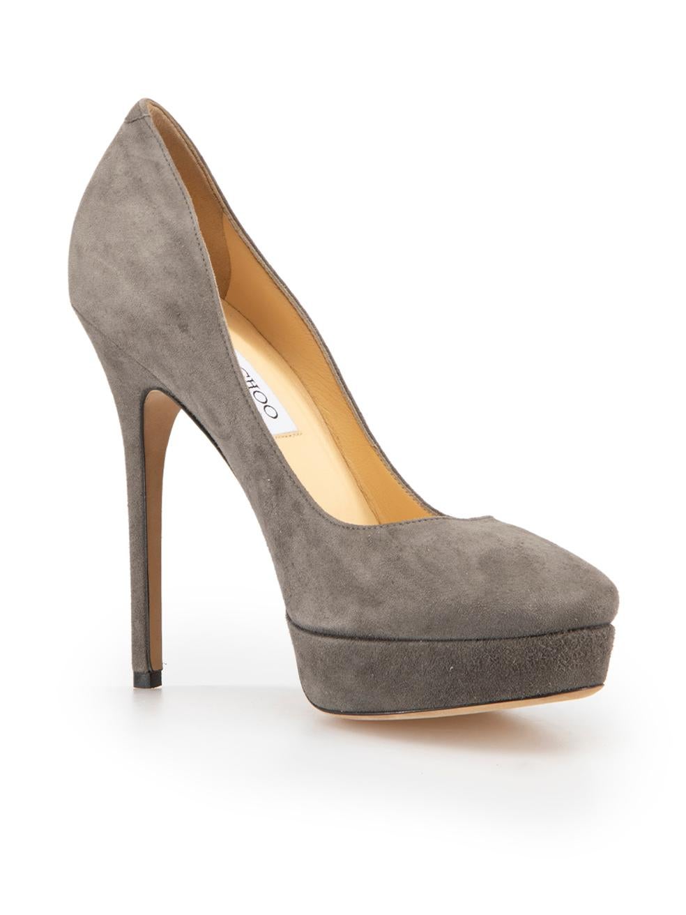 CONDITION is Good. Minor wear to shoes is evident. Light wear to both sides of both shoes with spotting on this used Jimmy Choo designer resale item.



Details


Grey

Suede

Pumps

Almond-toe

Slip-on

Platform



 

Made in