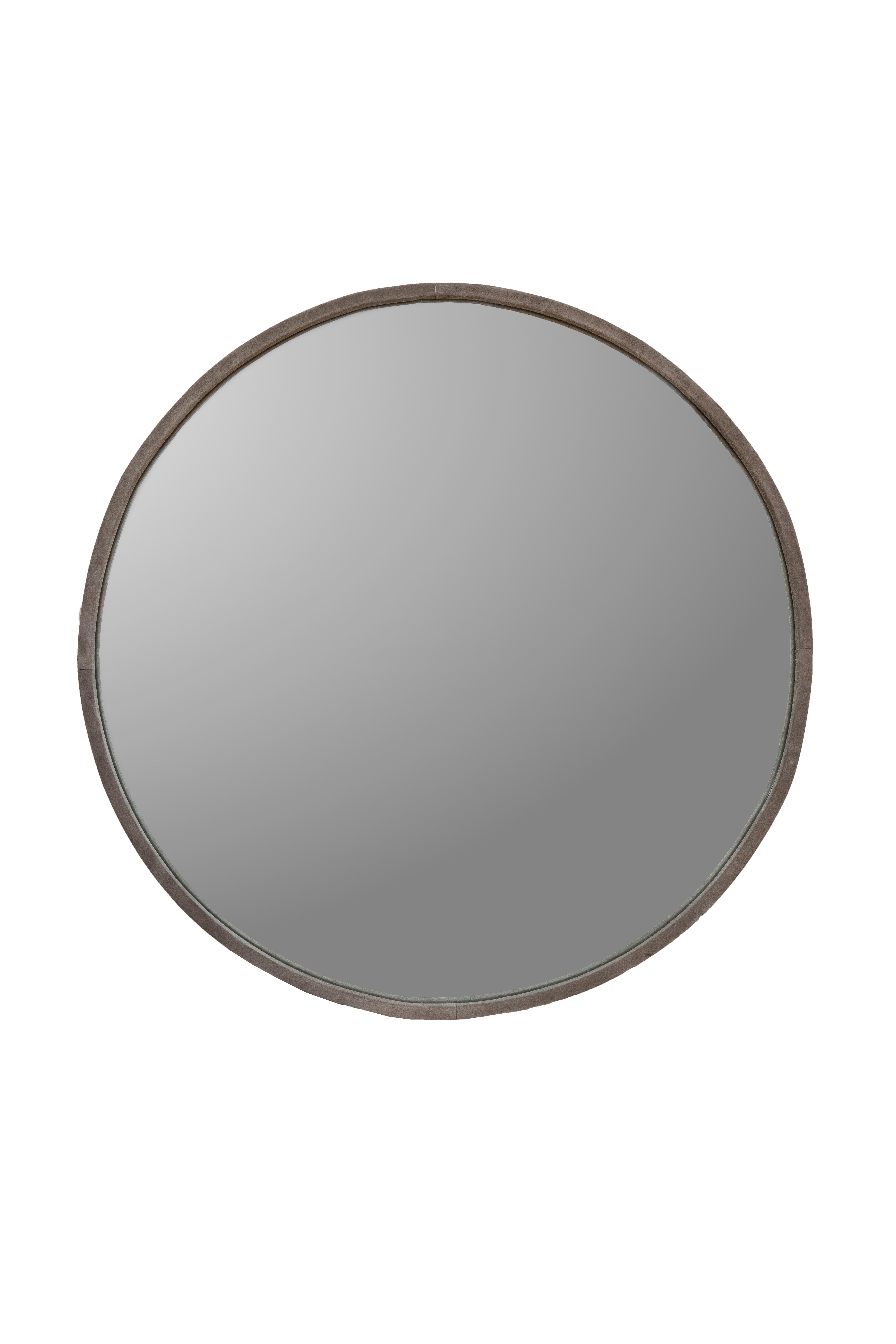 A Grey Suede mirror manufactured for The Line - a stunning piece that effortlessly combines sleek design with luxurious materials.