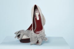 Grey suede stiletto with mohair bow Nina Ricci
