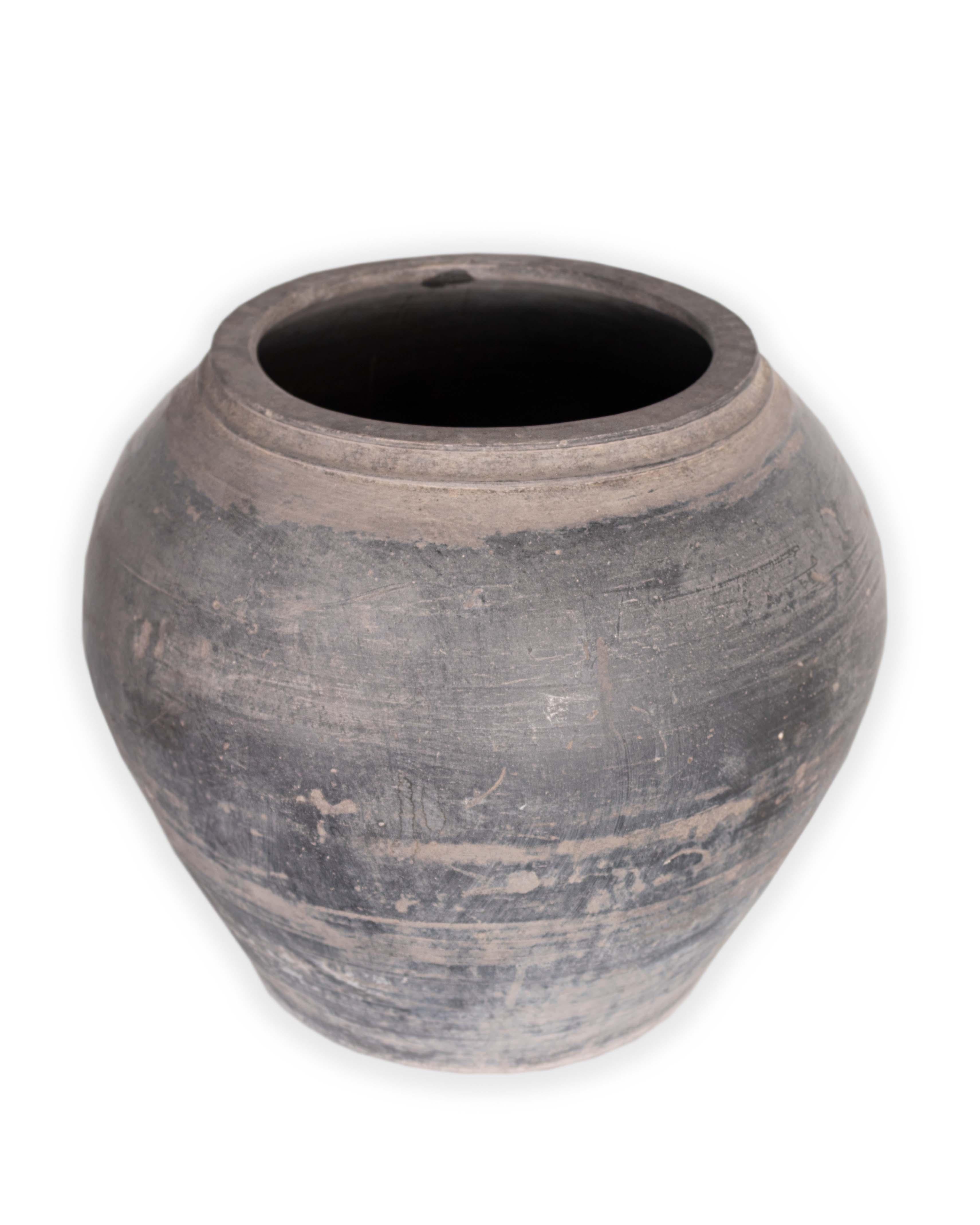 Antique grey terra cotta jar. 

This piece is a part of Brendan Bass’s one-of-a-kind collection, Le Monde. French for “The World”, the Le Monde collection is made up of rare and hard to find pieces curated by Brendan from estate sales, brocantes,