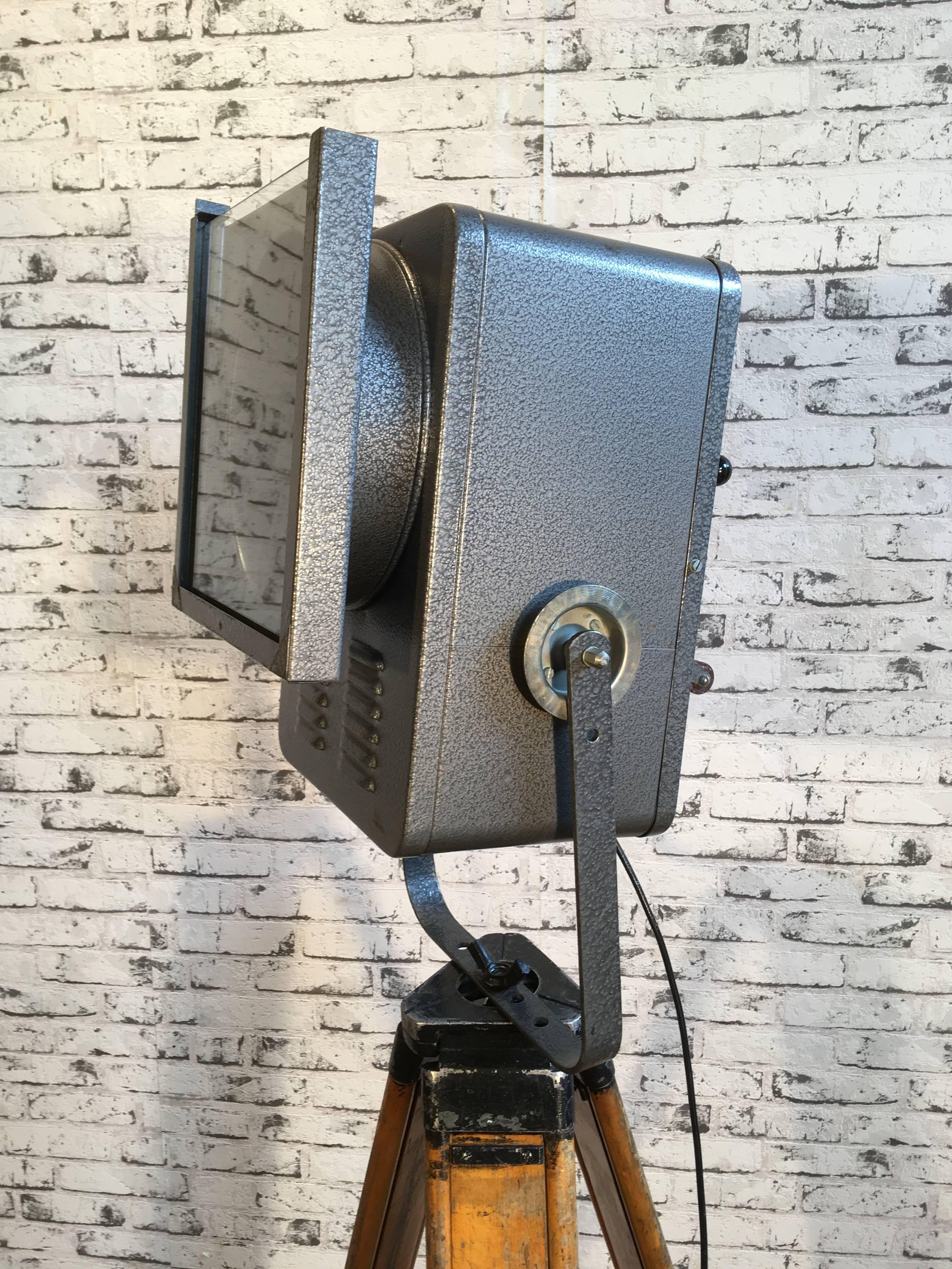 This adjustable theatre reflector comes from the former Czechoslovakia. It was made during the 1980s. Spotlight has beautiful grey hammer paint metal body and clear glass. New socket  for E 27 lightbulbs and wire.
Dimensions of the spotlight: 28 x
