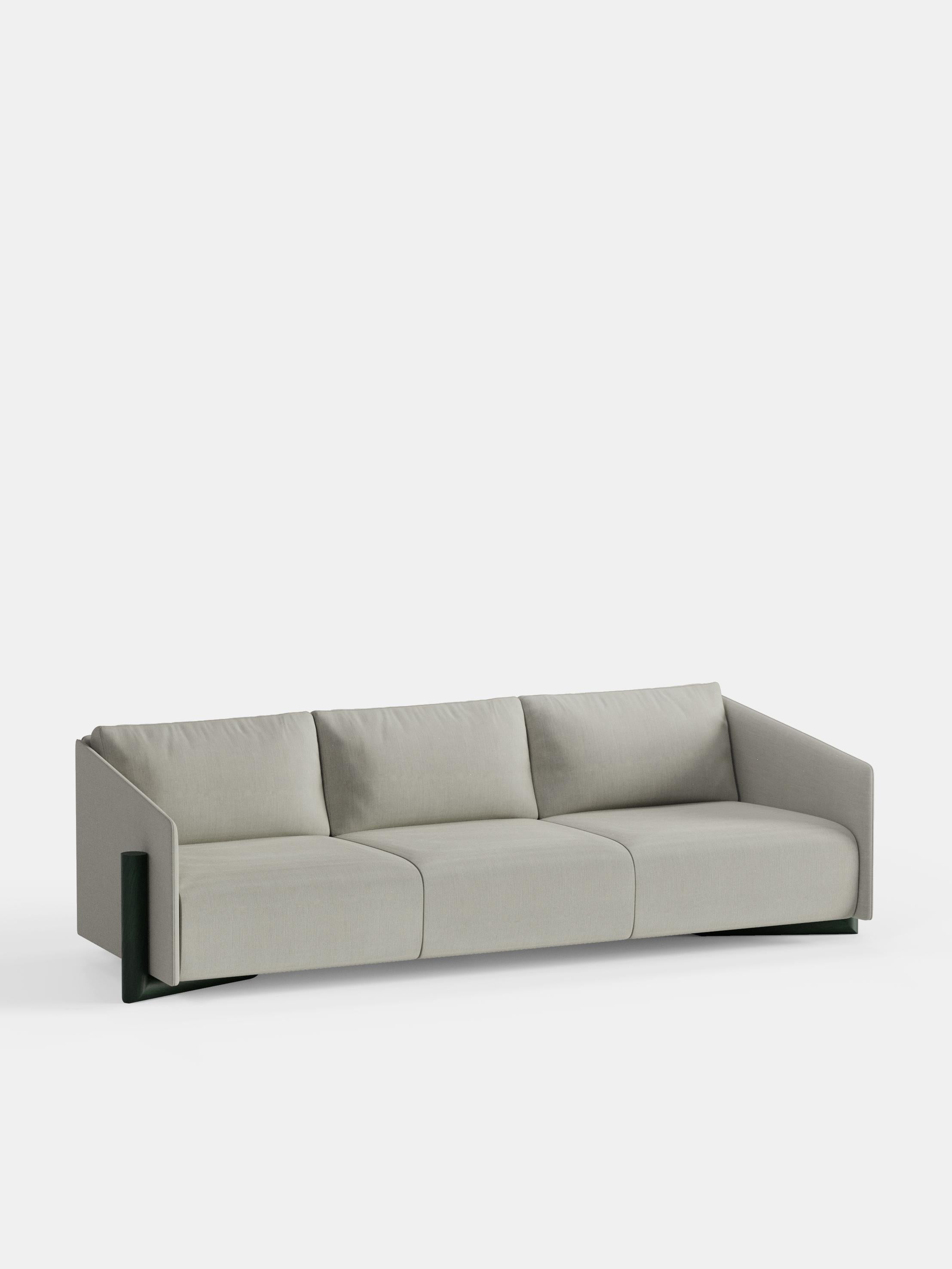 Grey Timber 4 Seater Sofa by Kann Design
Dimensions: D 104.5 x W 260 x H 75 cm.
Materials: Solid wood, elastic belts, HR foam, fabric upholstery Kvadrat Remix 126 (90% wool, 10% nylon).
Available in other fabrics.

The strong presence of textile in