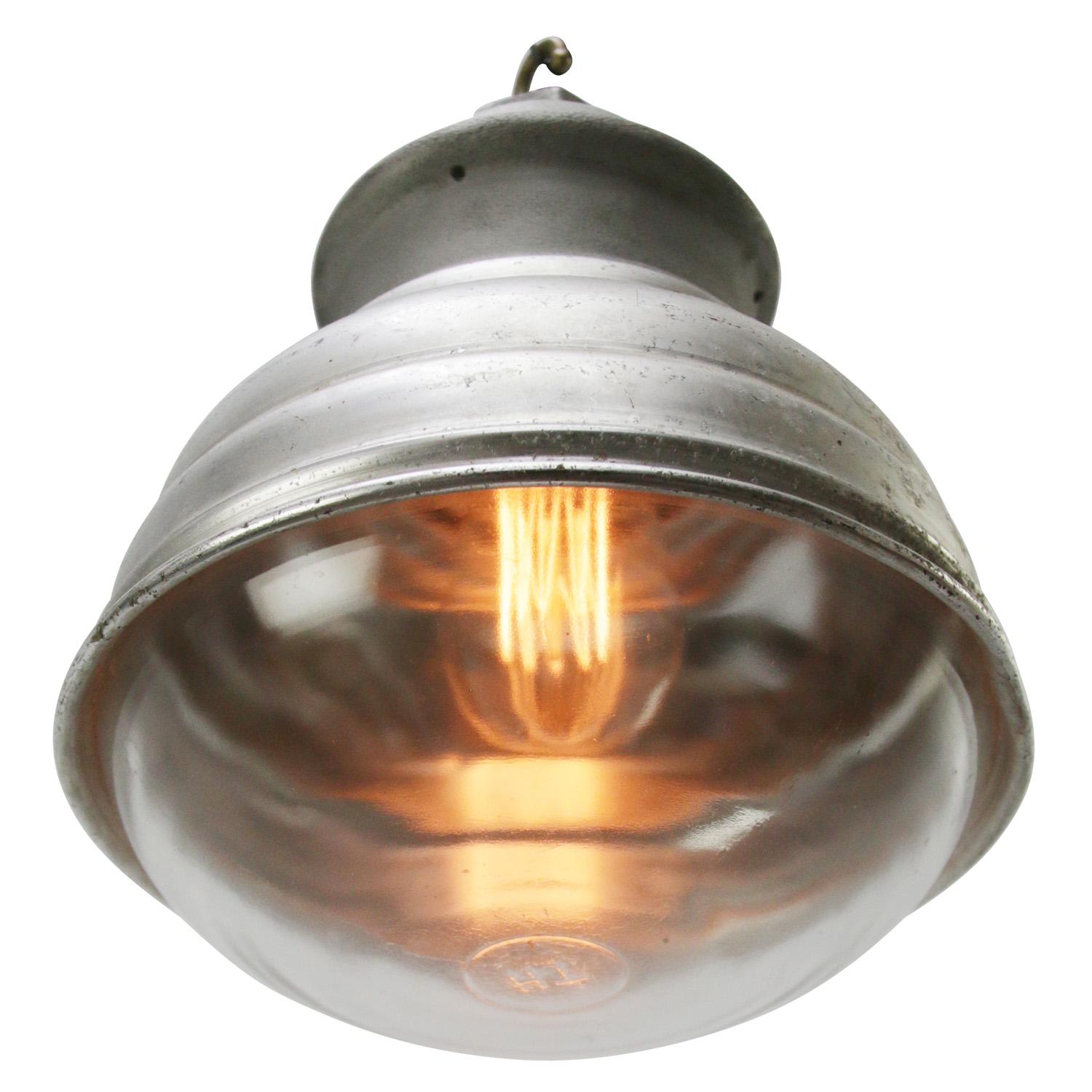 Industrial pendant lamp by Holophane Paris
Grey metal shade with clear glass
Brass top

weight 1.90 kg / 4.2 lb

Priced per individual item. All lamps have been made suitable by international standards for incandescent light bulbs, energy-efficient