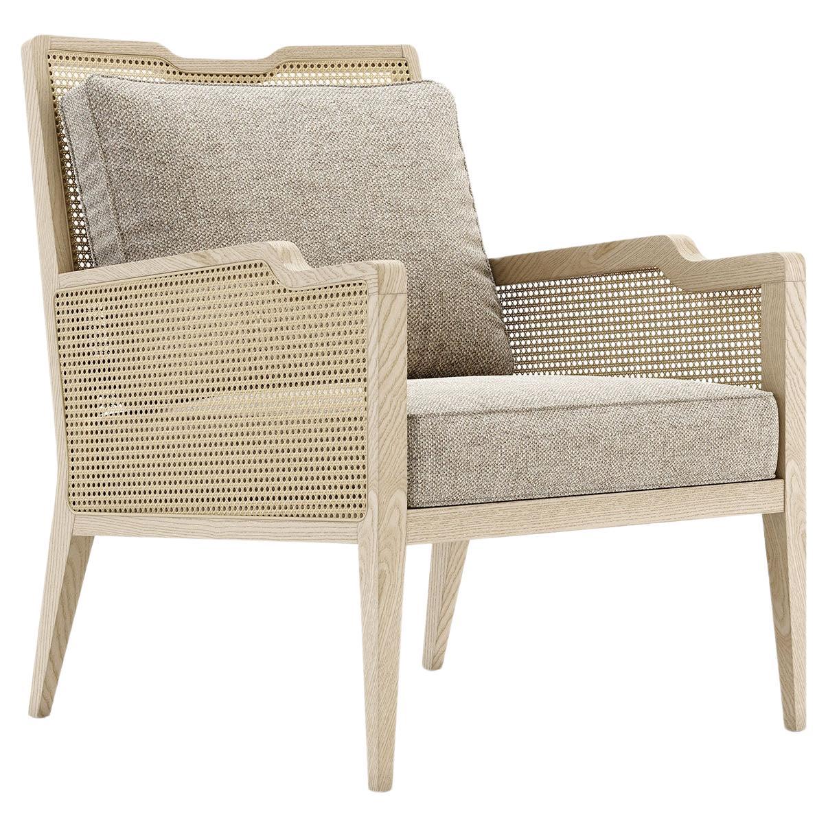 Grey Washed Oak Lounge Chair With Rattan Detailing On The Back And Arms