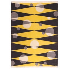 Tappeto in lana grigio-giallo con forme geometriche di Cecilia Setterdahl per CarpetsCC