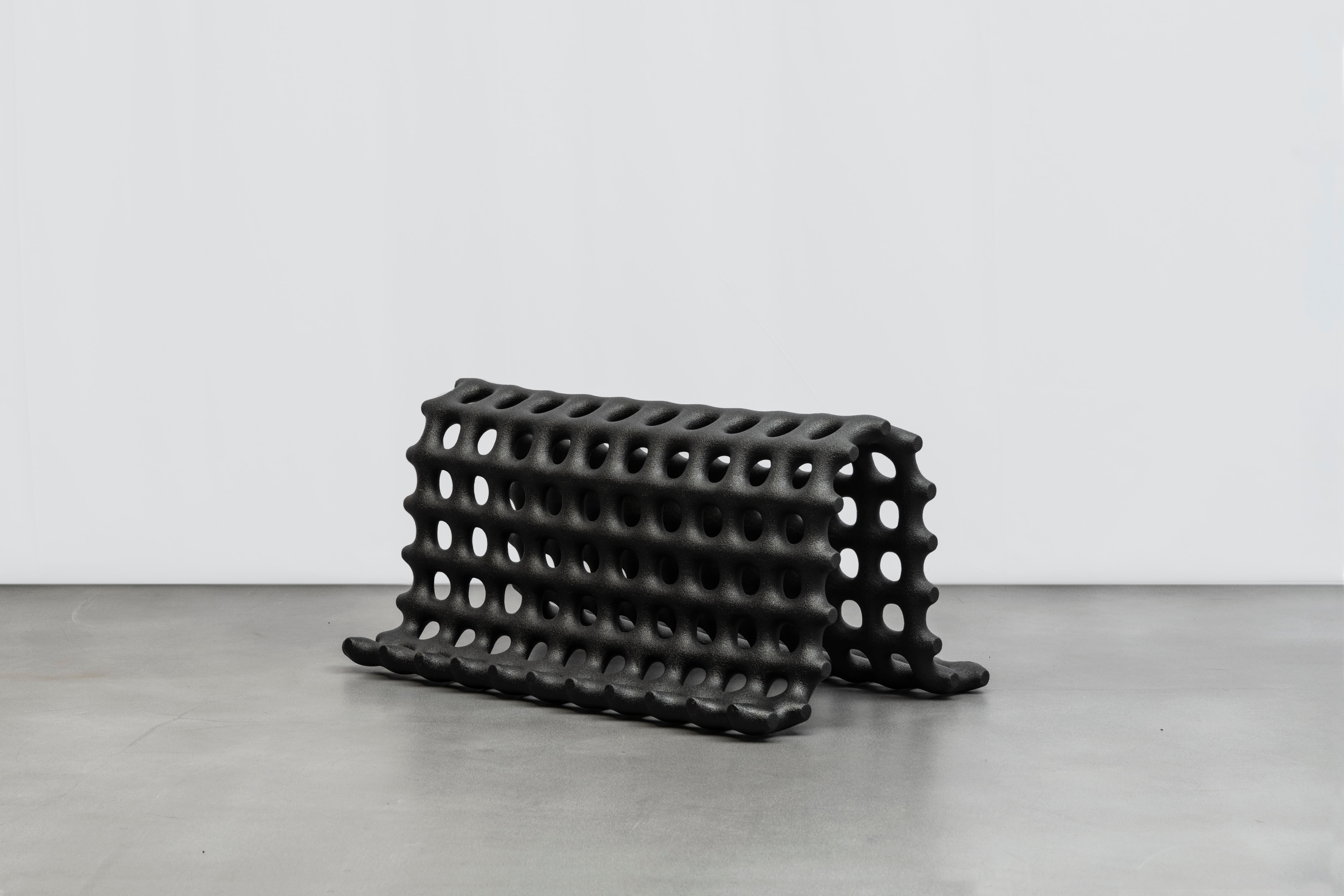 Grid bench by Hot Wire Extensions
Limited edition
Materials: Waste SLS 3D nylon powder, sand from sustainable sources
Dimensions: H 49 x W 100 x D 67 cm
Colours: black, white

Hot Wire Extensions is a young sustainable design brand, presenting a