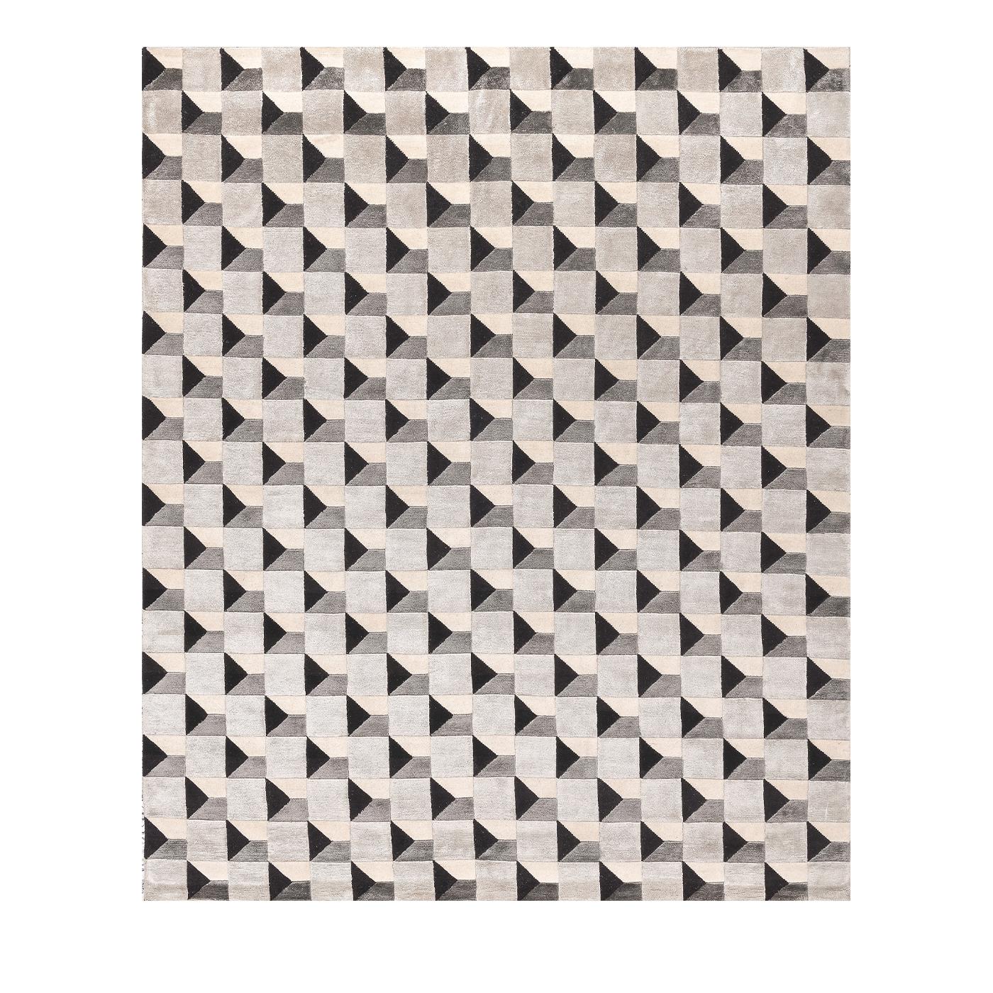 The graphic design of this Grid rug has a spectacular three dimensional effect to bring a dynamic quality to a contemporary decor. The rug is 300 x 240 cm and is composed of 50% silk and 50% Himalayan wool. These unique models are customizable in
