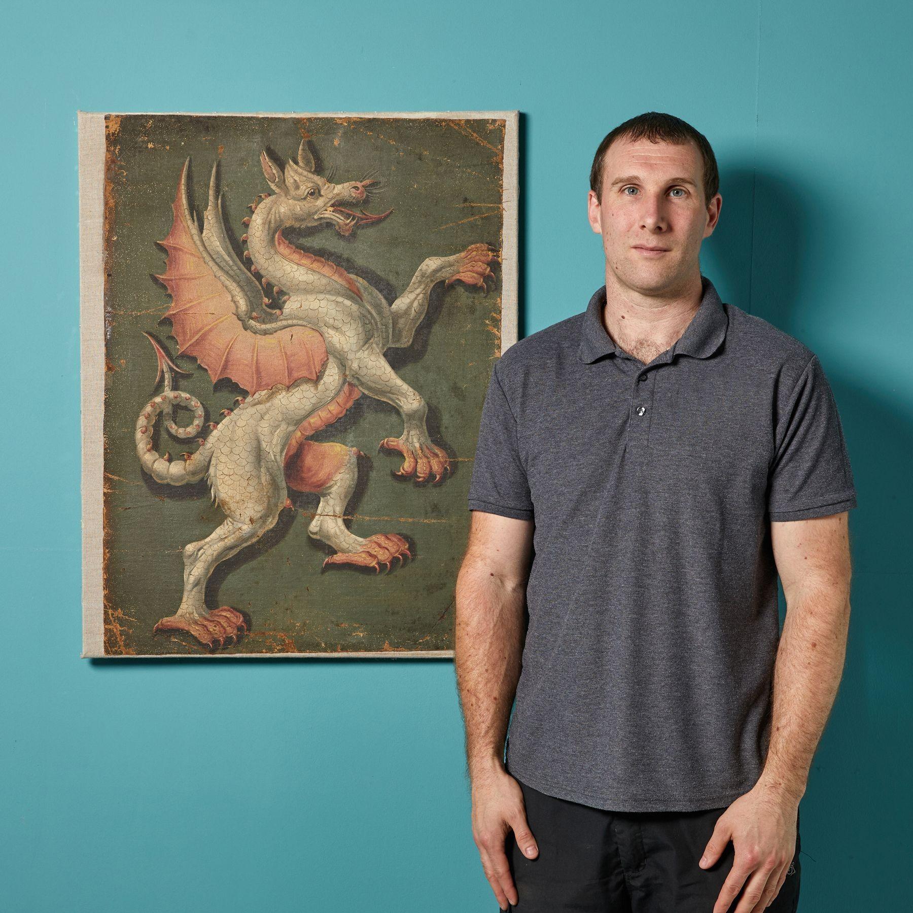 This previously formed part of a large heraldic panel. It is one of four similar paintings removed from an English country house.
 