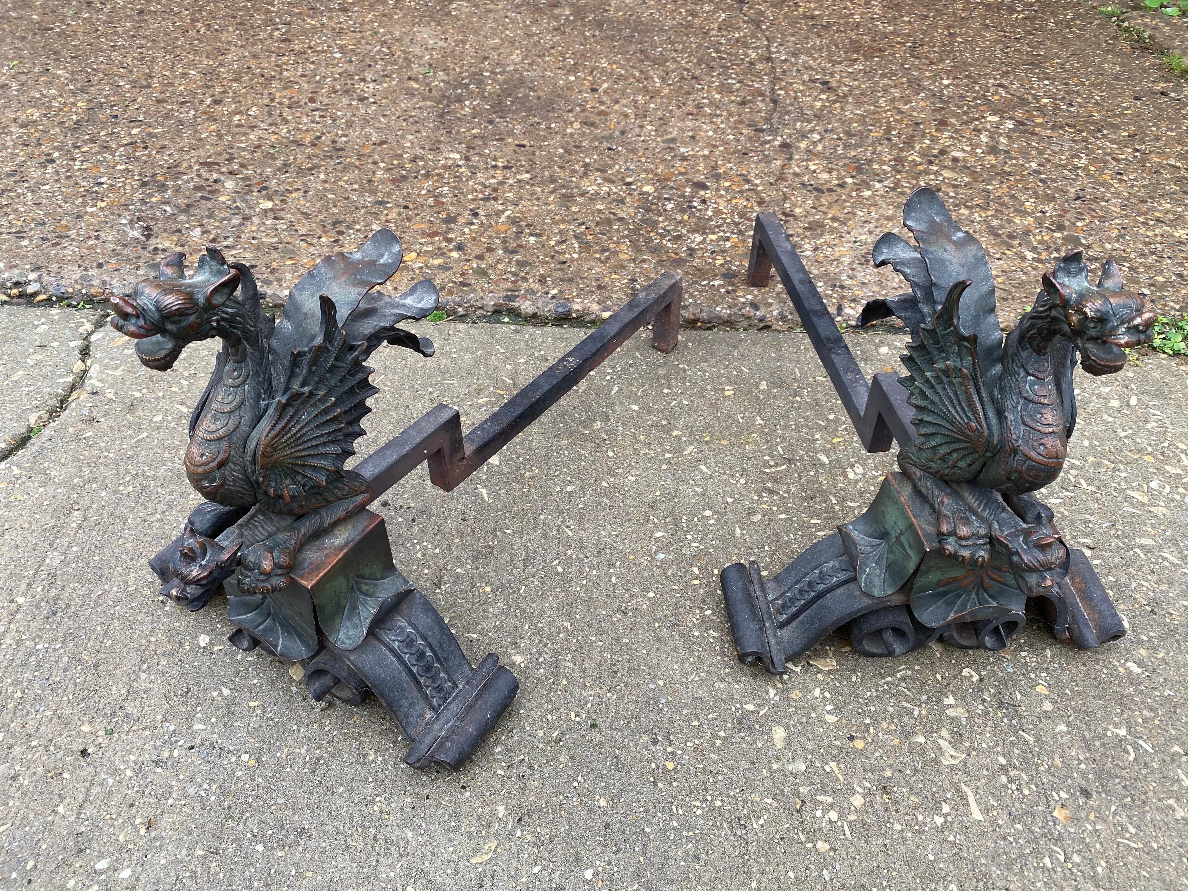 Very ornate dragon/ griffin andirons with a beautiful patina. Very heavy and well crafted. Perfect to complete that fireplace!
