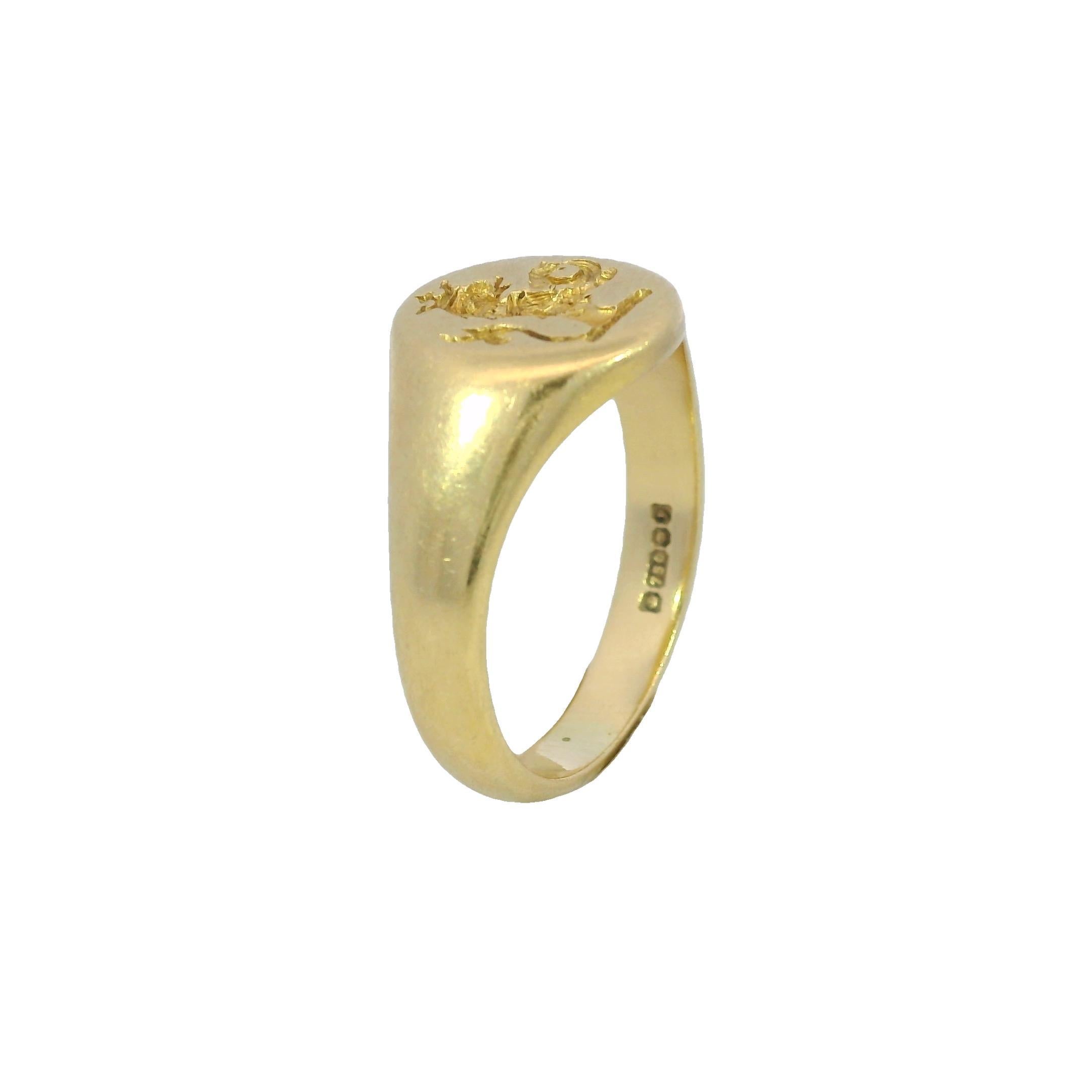 Griffin Signet Ring 18K Yellow Gold Size 9 Victorian Style

This 18k yellow gold signet ring offers a timeless silhouette with a refined, understated presence. The top of the ring features an intricately engraved design, adding a layer of detail and