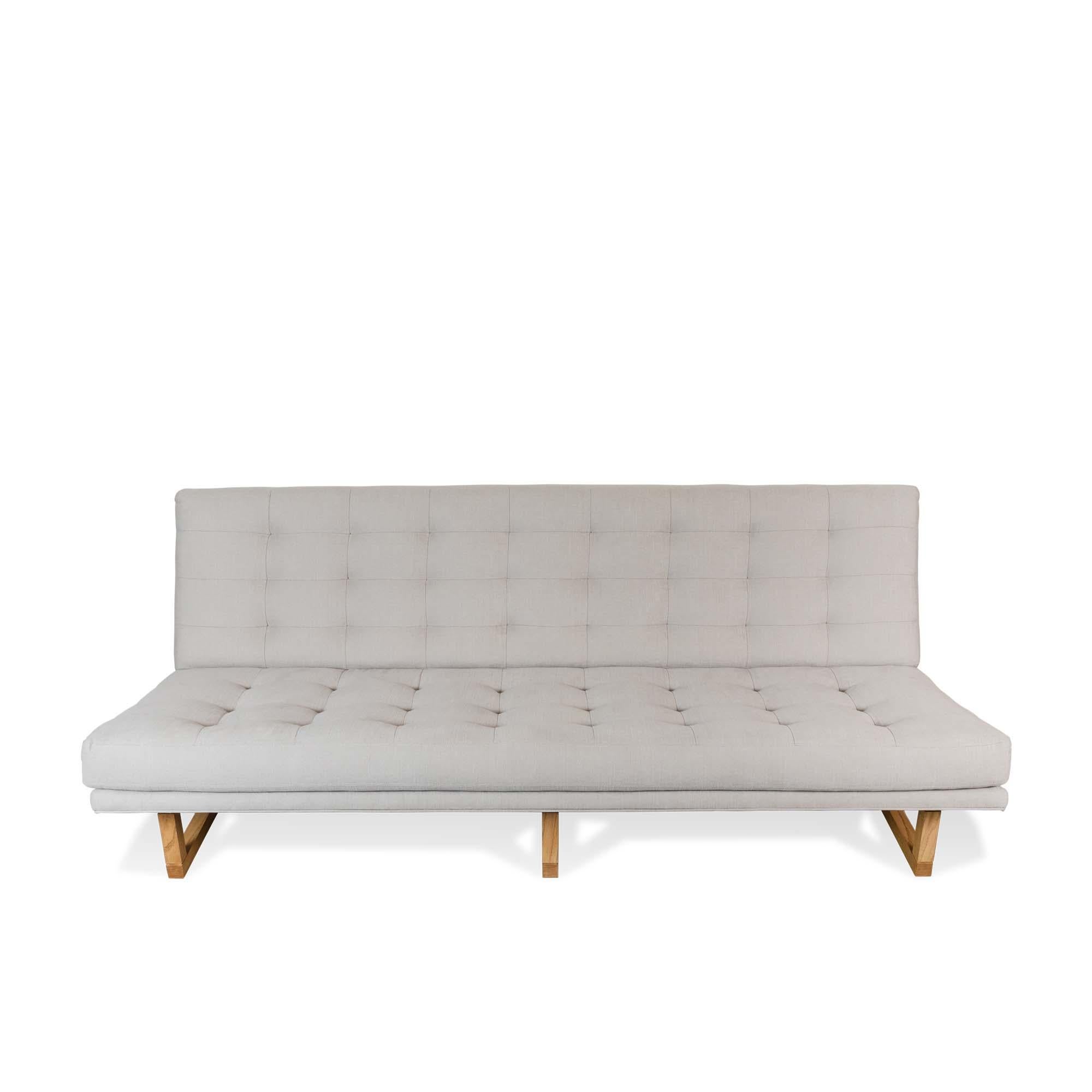 The Griffin sofa is a wide, armless lounge sofa that features biscuit tufting with no buttons. Frame available in American walnut or white oak.

The Lawson-Fenning Collection is designed and handmade in Los Angeles, California.
Reach out to