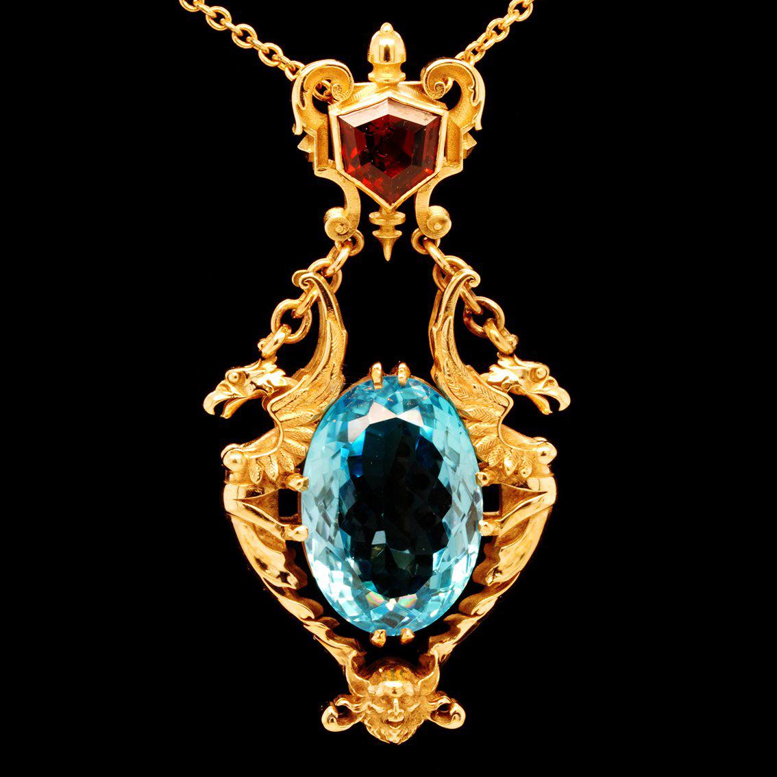 28ct Oval Swiss Blue Topaz, Garnet 9k Yellow Gold Antique Style Pendant Necklace For Sale 3