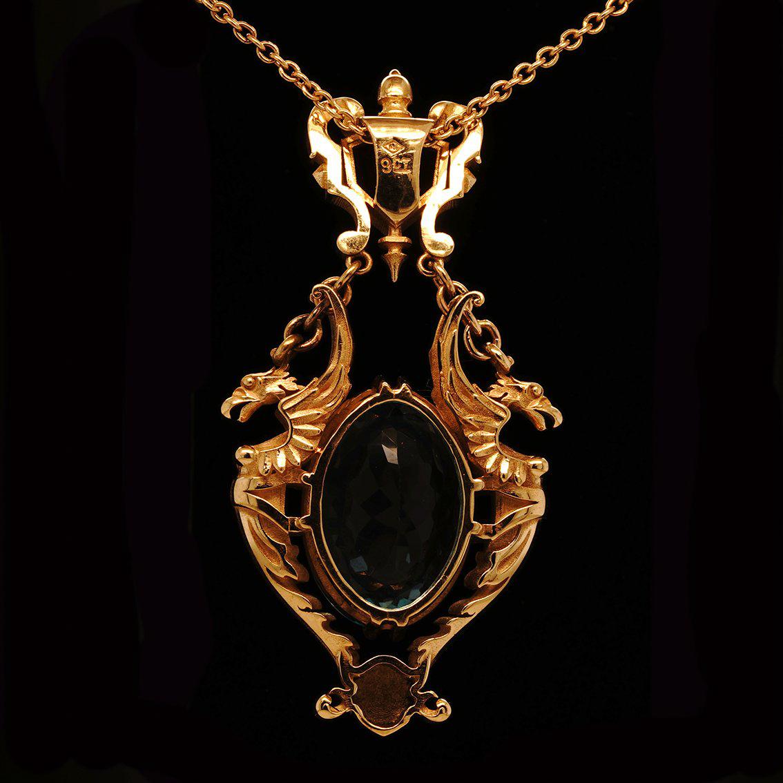 28ct Oval Swiss Blue Topaz, Garnet 9k Yellow Gold Antique Style Pendant Necklace For Sale 4