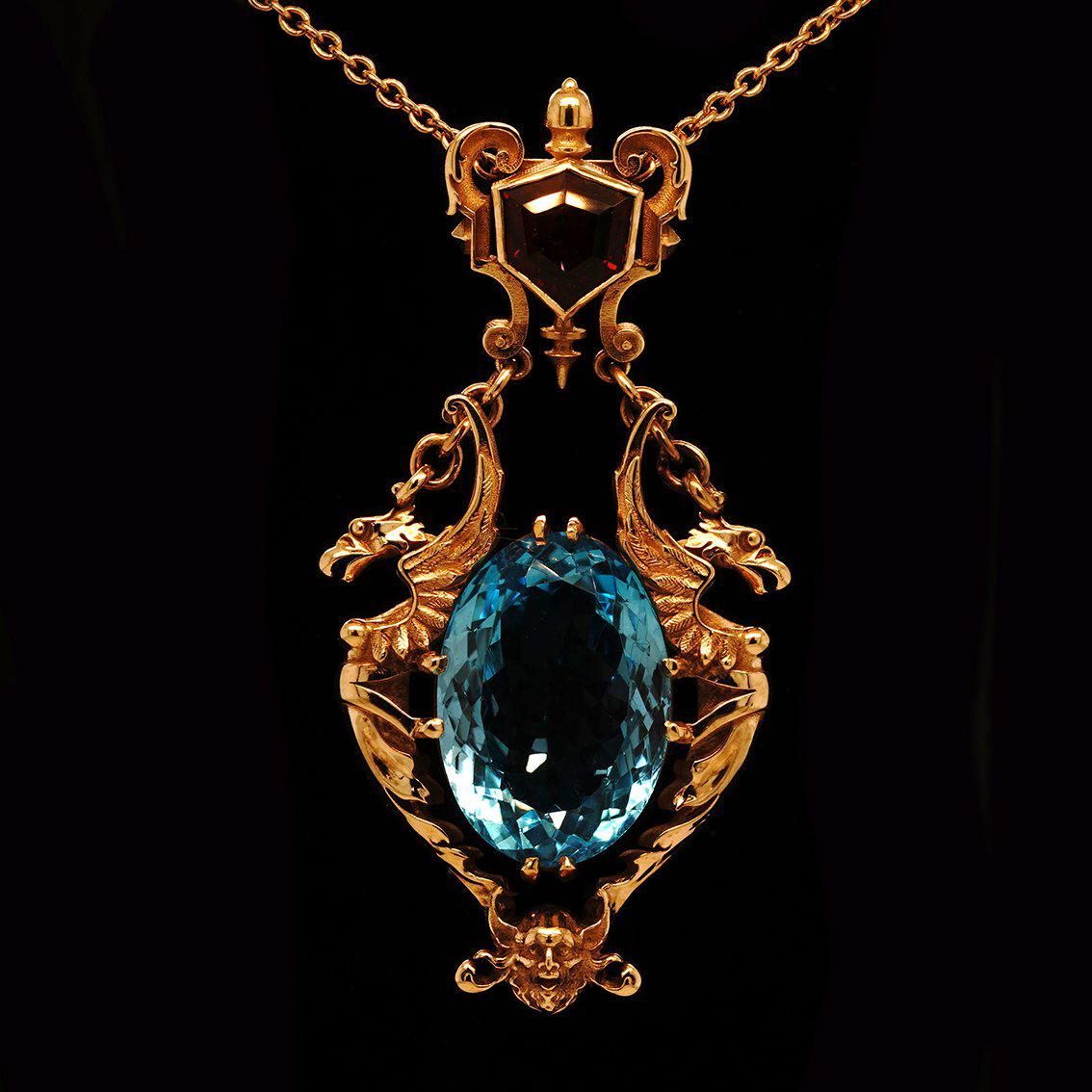 28ct Oval Swiss Blue Topaz, Garnet 9k Yellow Gold Antique Style Pendant Necklace For Sale 7