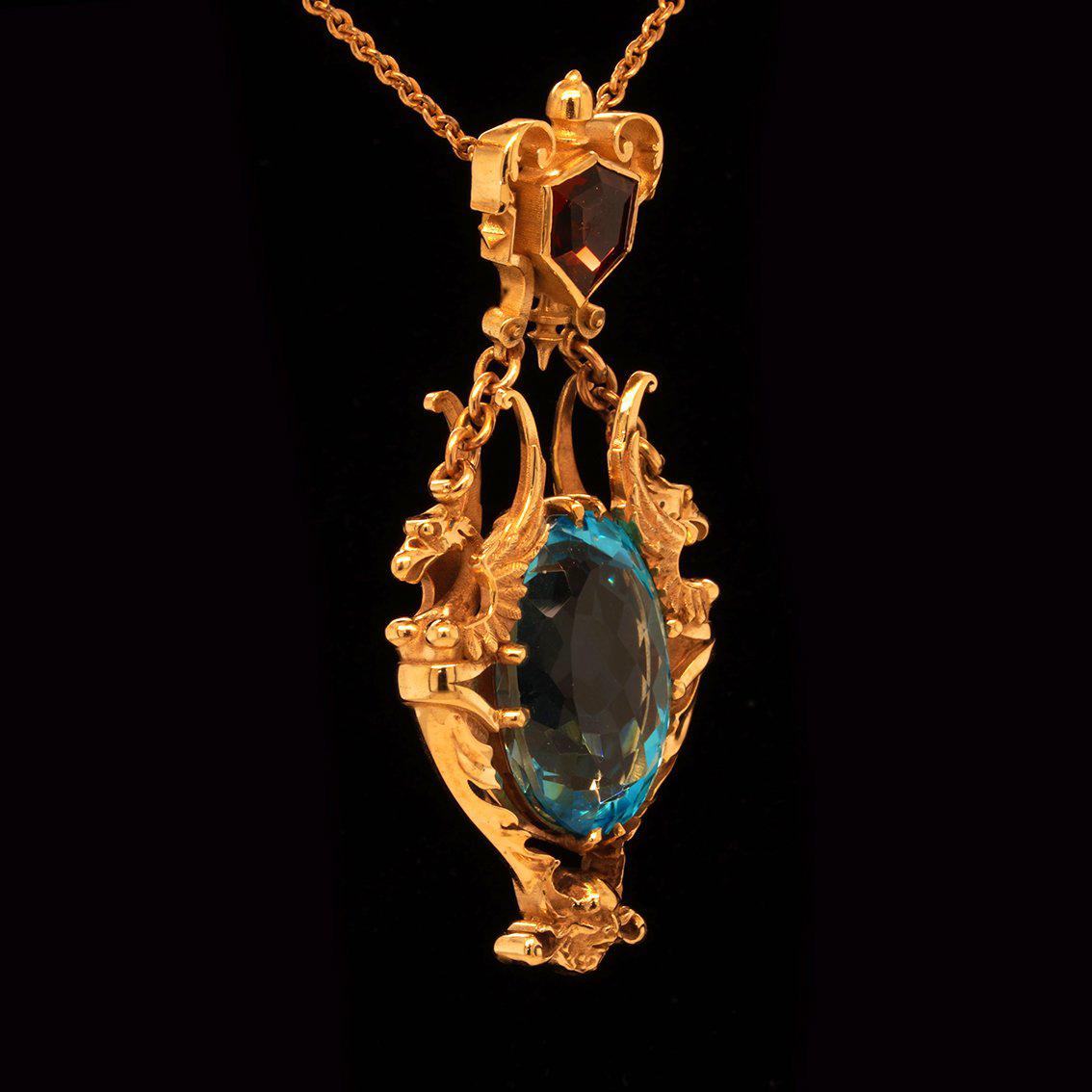 28ct Oval Swiss Blue Topaz, Garnet 9k Yellow Gold Antique Style Pendant Necklace For Sale 11