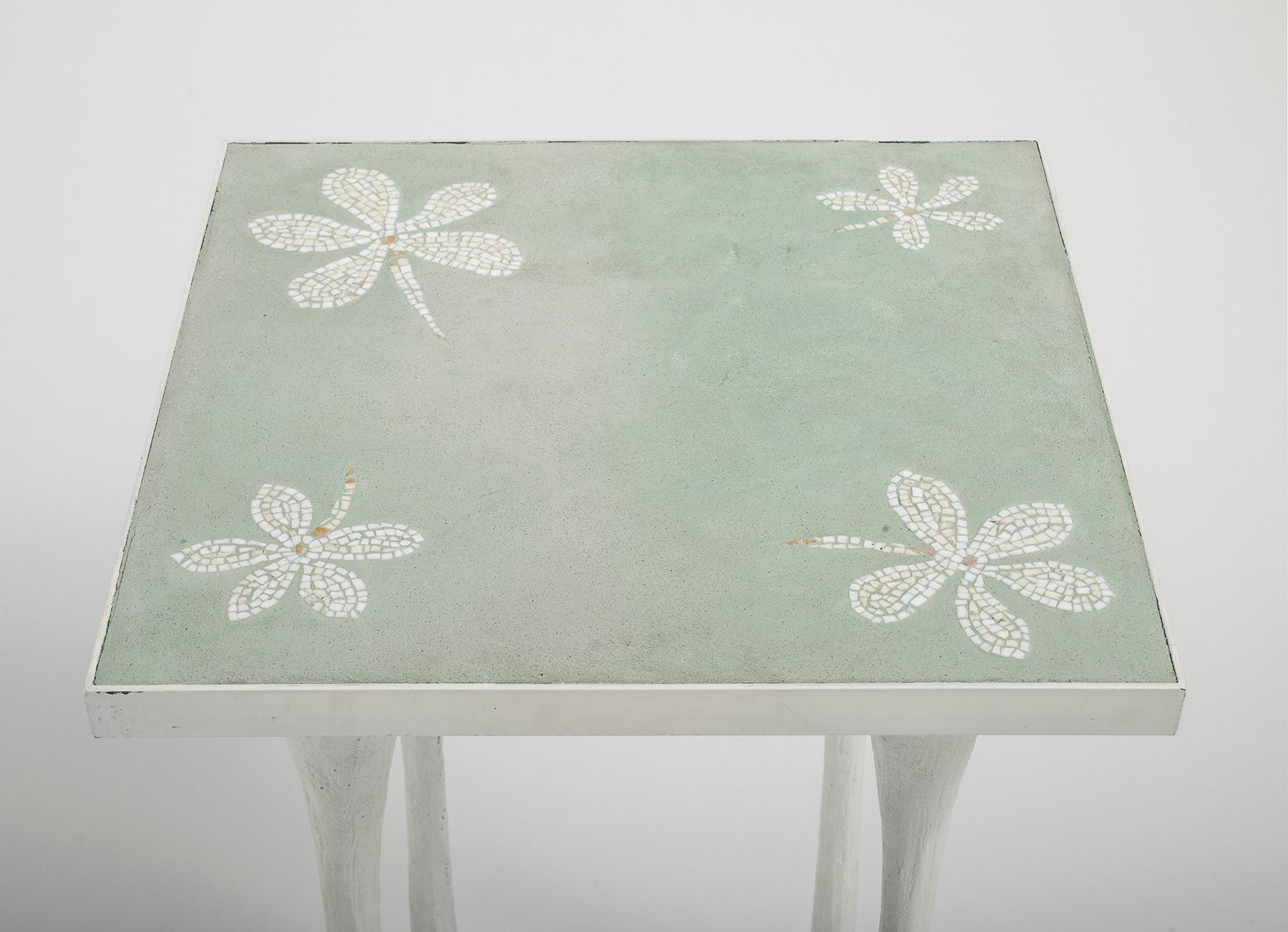 A rare occasional table by Argentine artist Grillo Demo, cast and enameled aluminum, enameled steel, ceramic, with glass tiles.