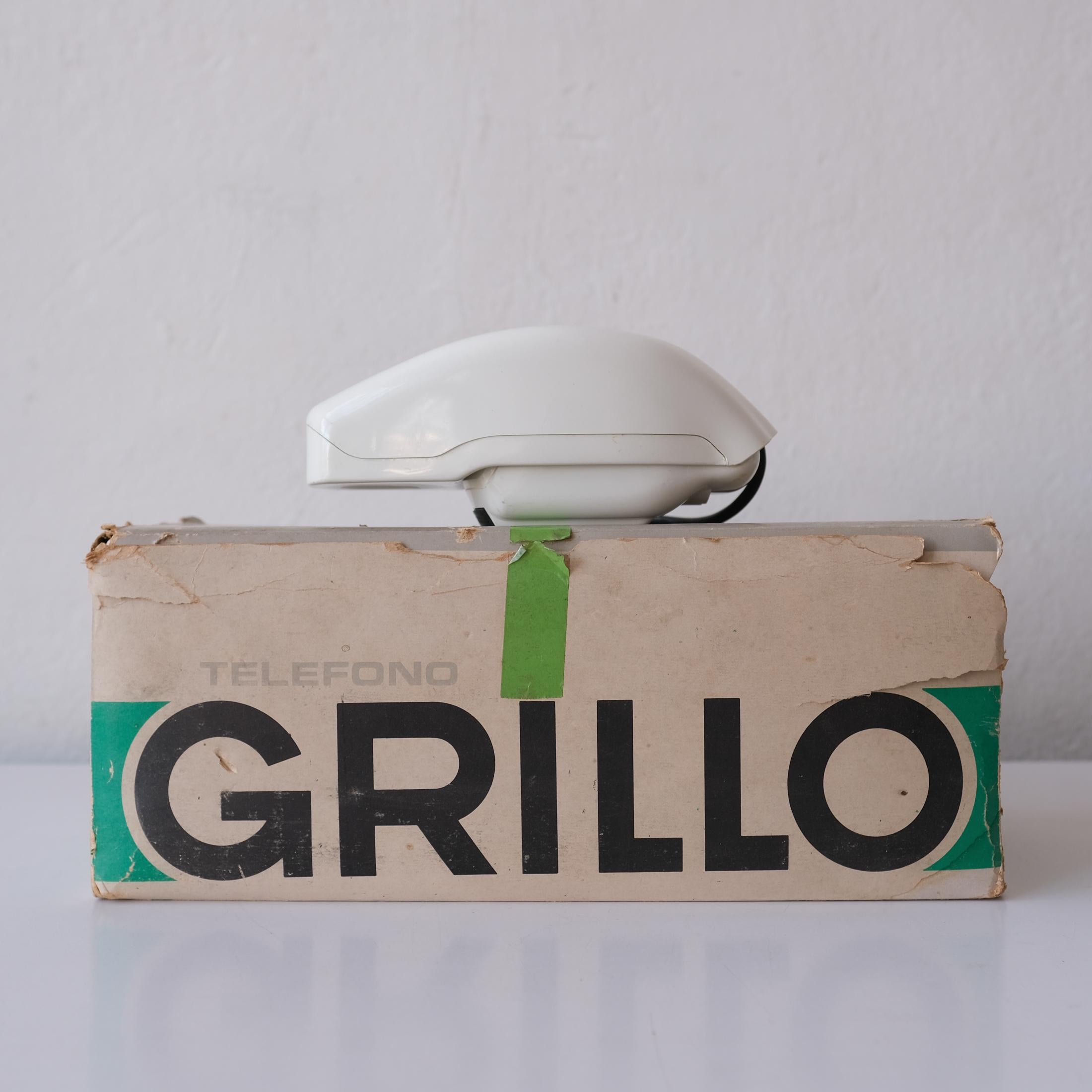 Grillo (Cricket) folding telephone by Marco Zanuso Richard Sapper with the original box from 1966. Part of the MoMA New York permanent collection. A revolutionary space age modern design and perhaps the first flip phone. Very rare example with the