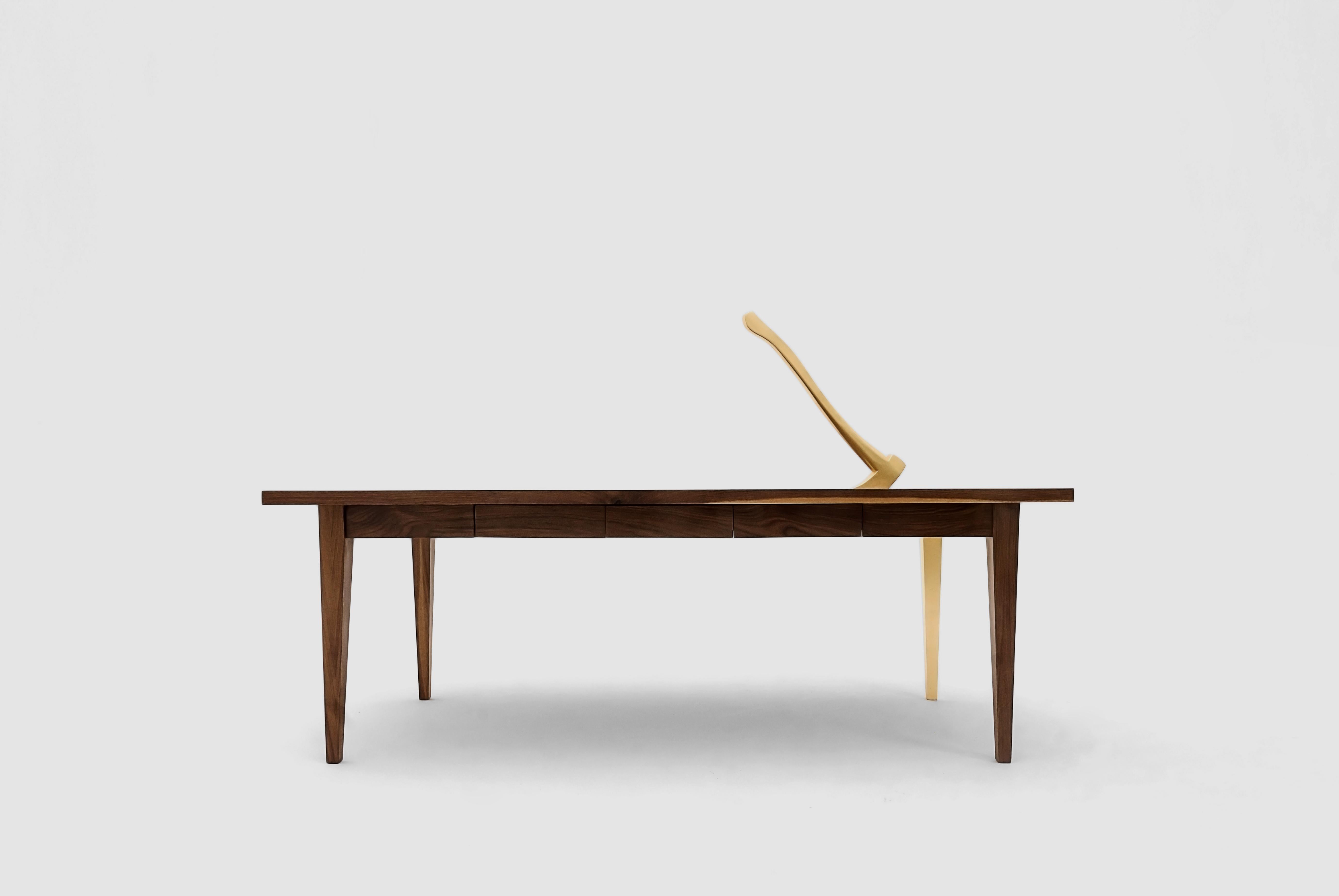 Grimm sculptured table by Hugo Lugo.
Dimensions: D 170 x W 51 x H 85 cm.
Materials: walnut wood, gold leaf.

Table made of walnut and gold leaf.

He has a degree in Visual Arts from the University of Montemorelos in N.L. He studied the Master